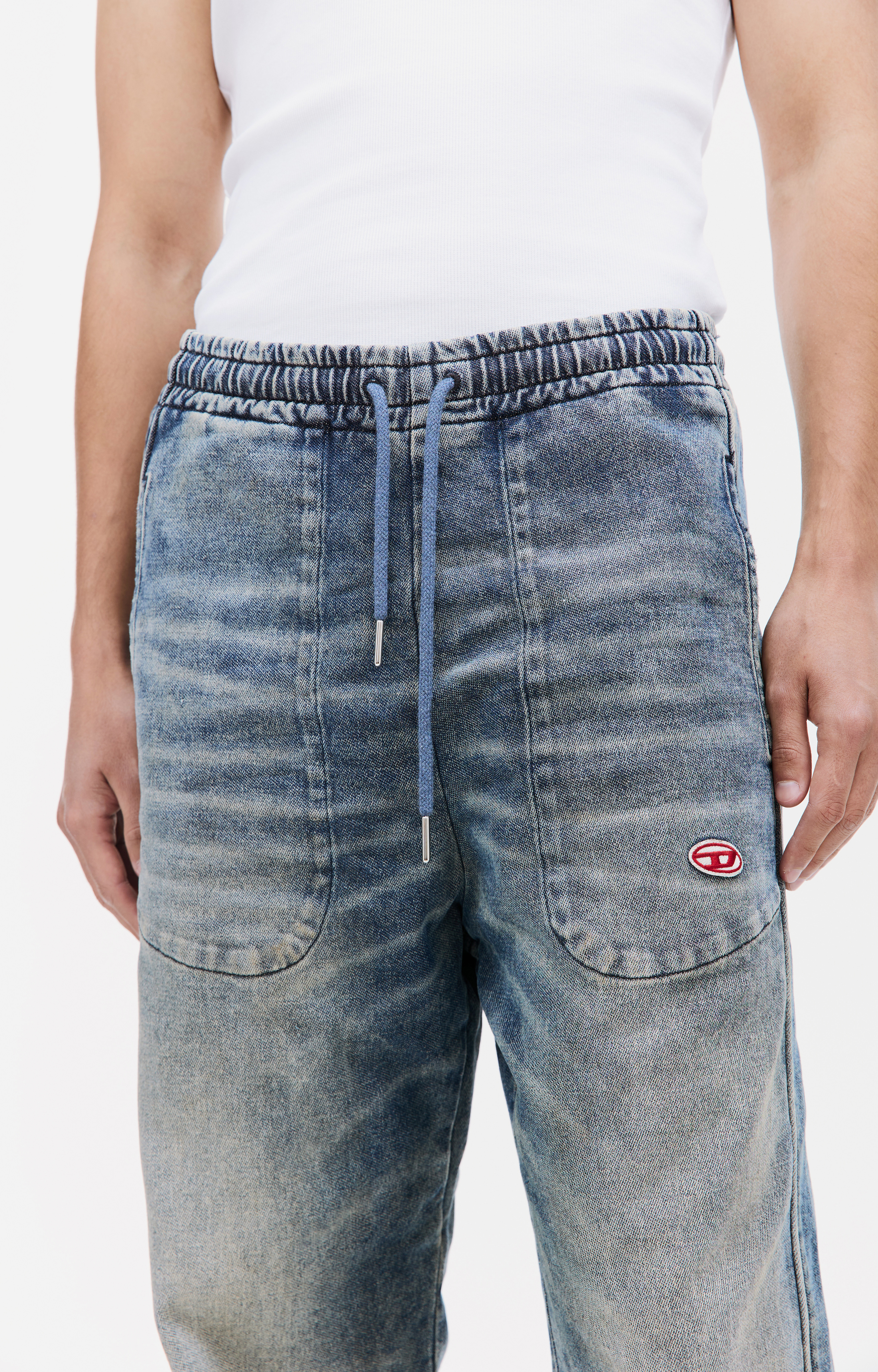 Buy Diesel men blue d-martians-ne denim sweatpants for $570