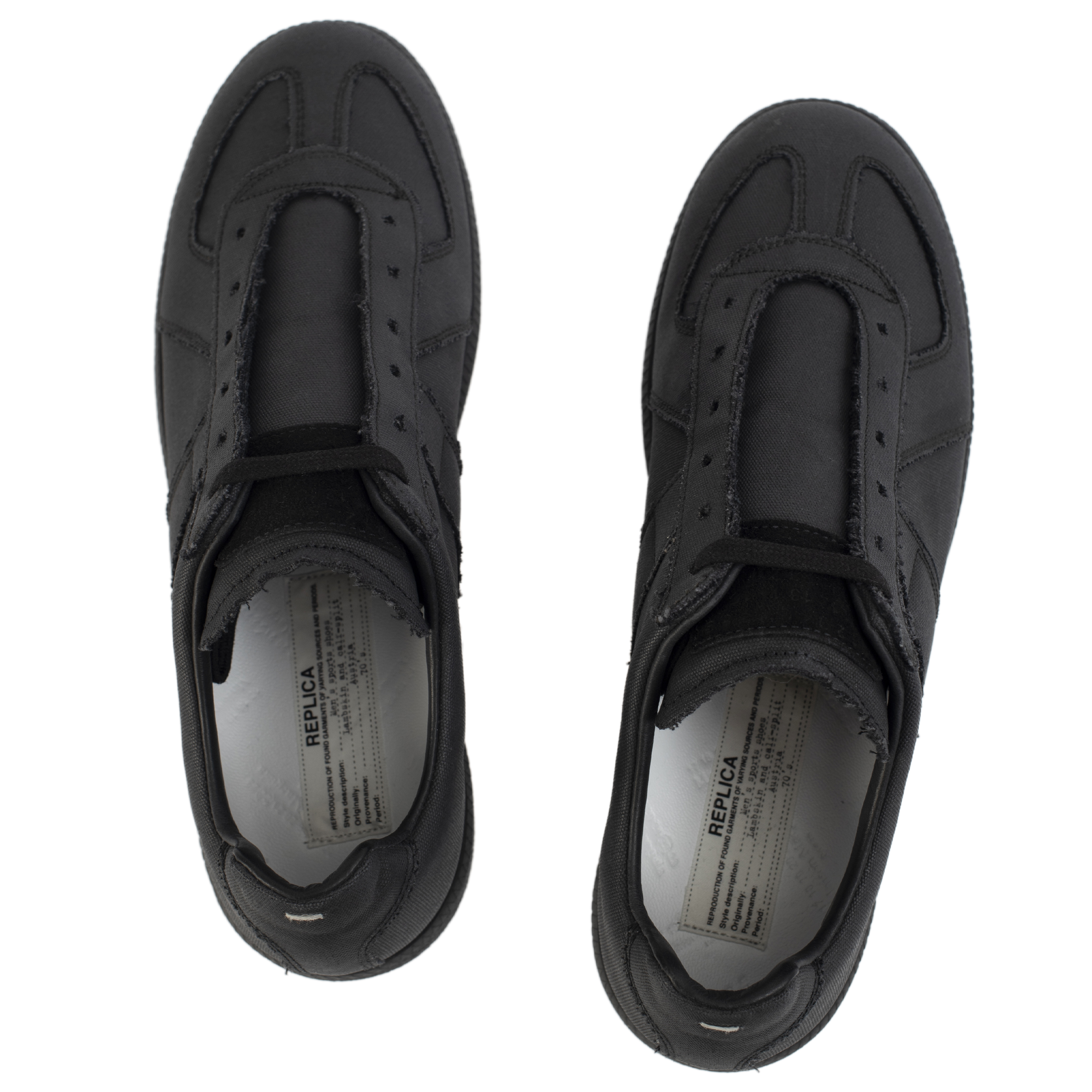 Buy Maison Margiela men black replica canvas sneakers for $565 