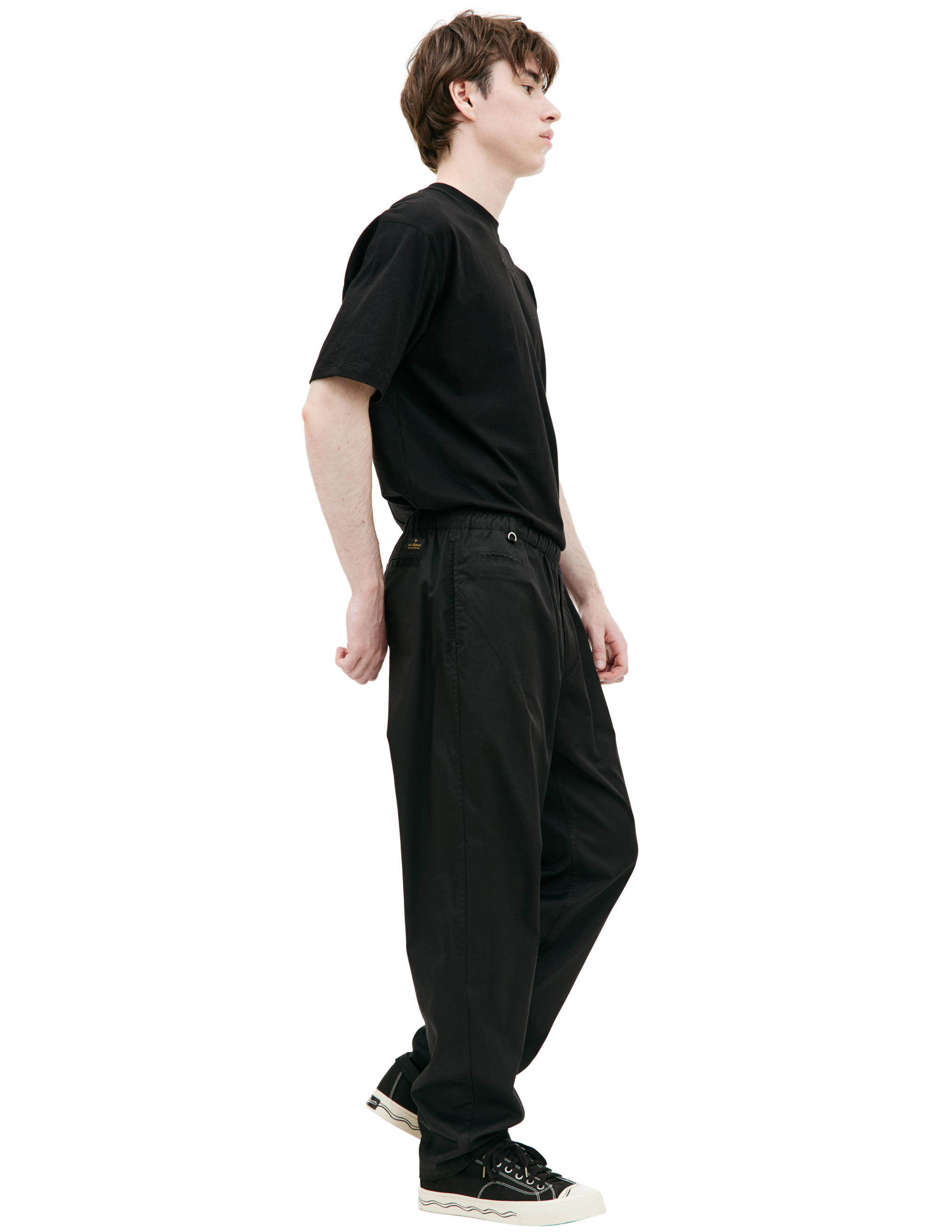 Shop Undercover Embroidered Logo Trousers In Black