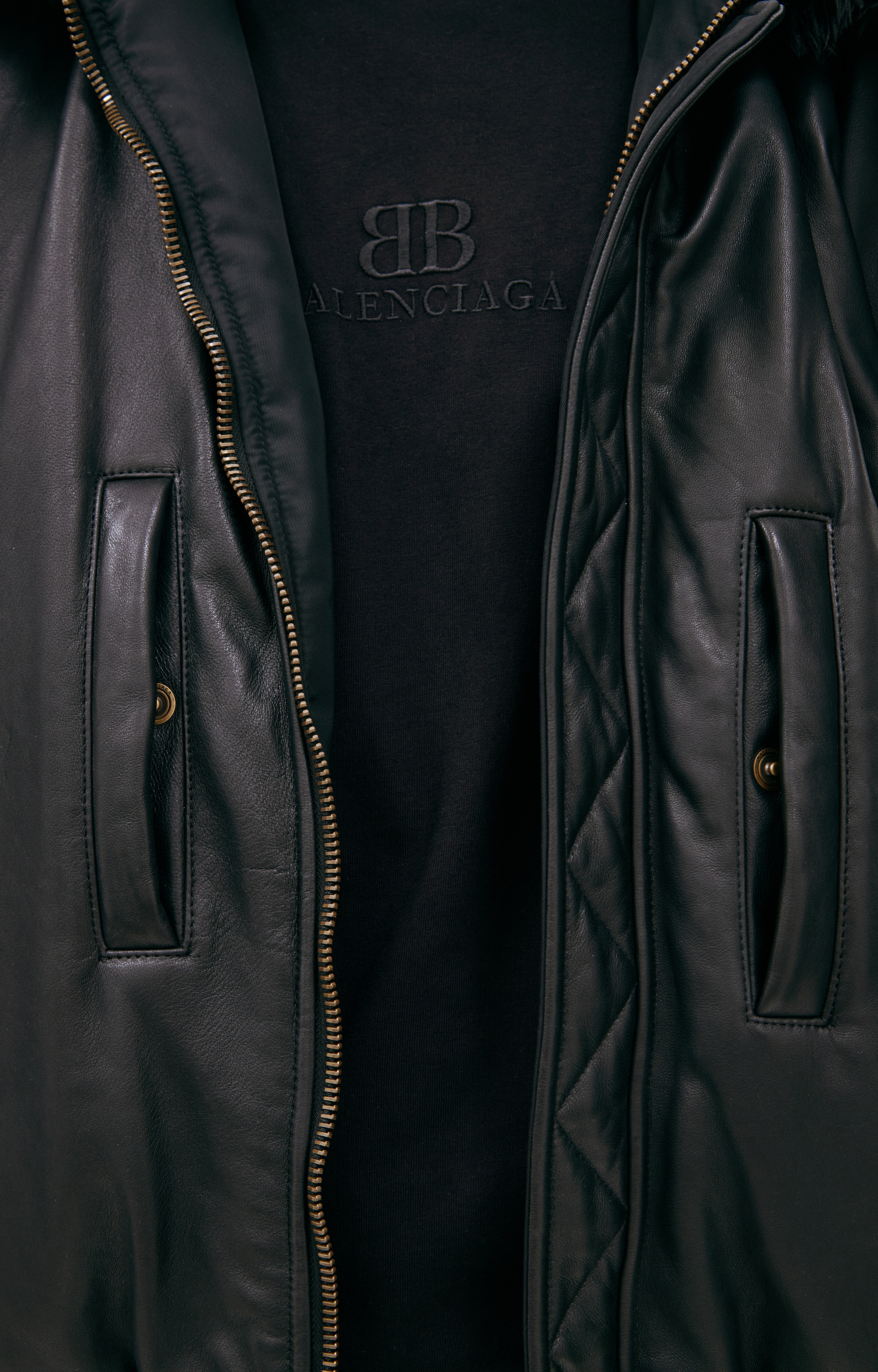 Buy Balenciaga men black bomber with fur collar for $7,625 online