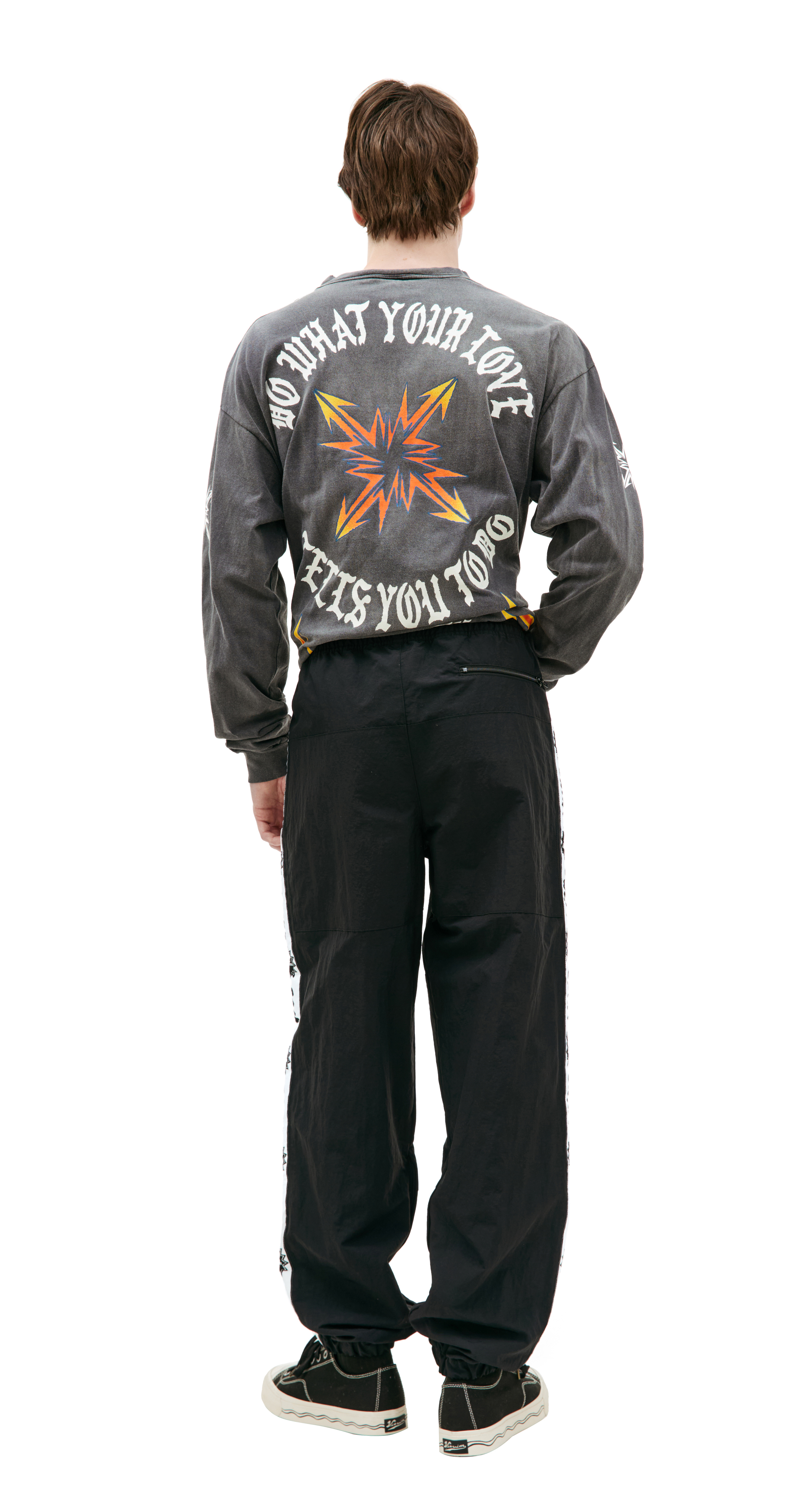 Buy Saint Mxxxxxx men black side tape track trousers for $615