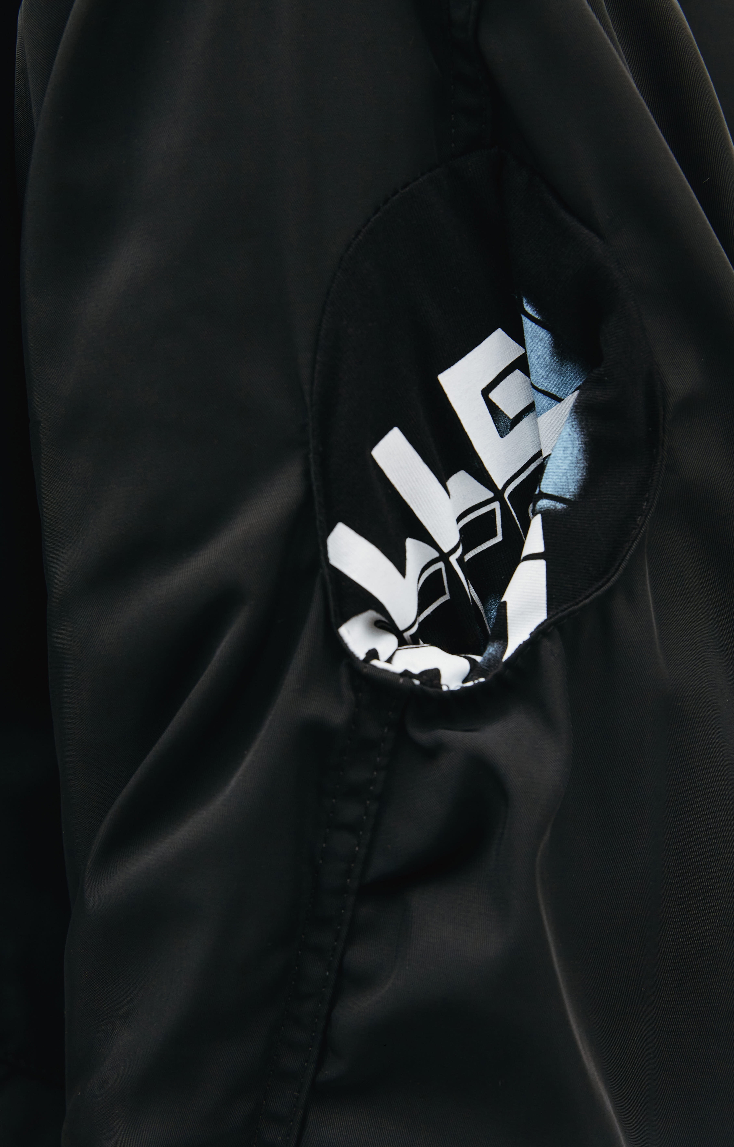 Buy Raf Simons women oversized printed parka in black for