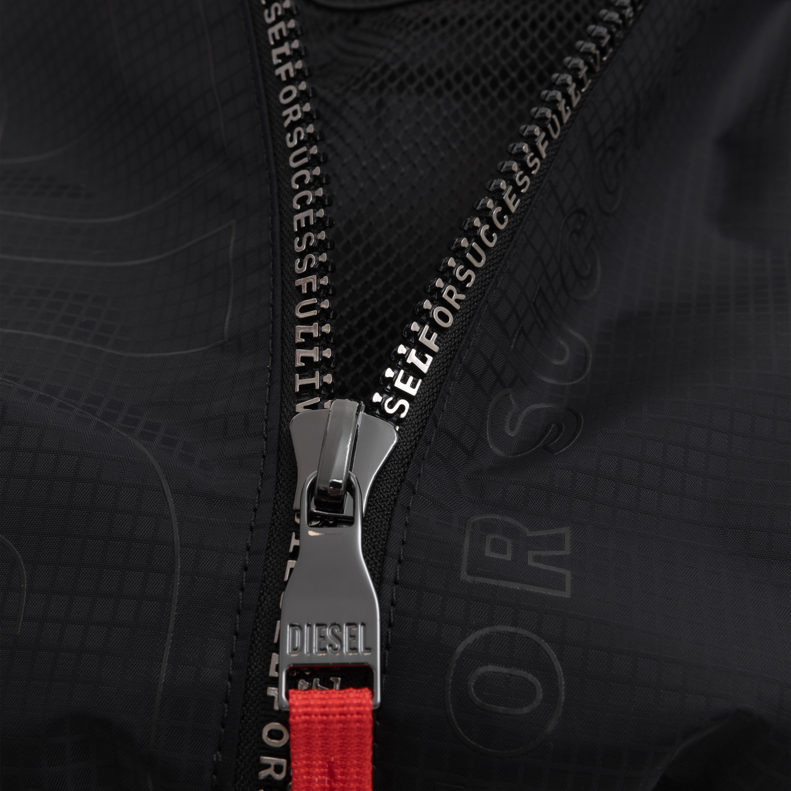 DIESEL ZIP-D-SLING PLAID BACKPACK