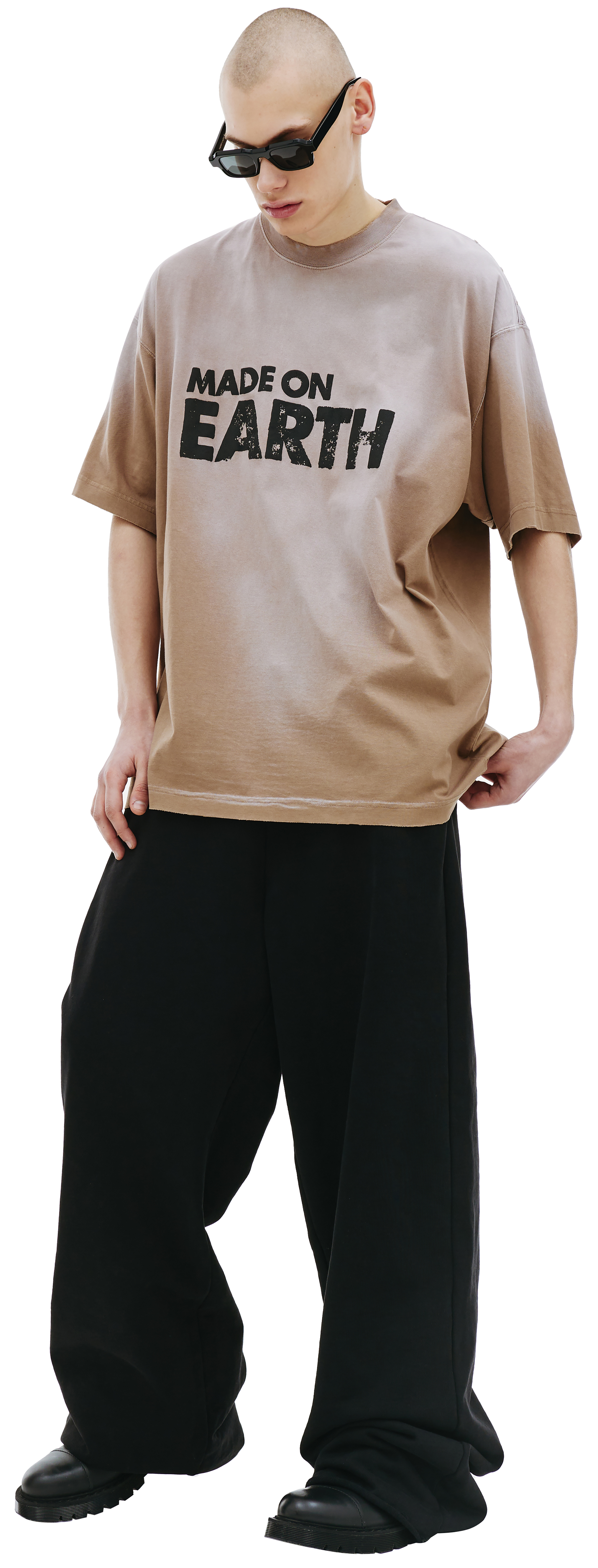 Buy VETEMENTS men brown made on earth oversized t-shirt for $348