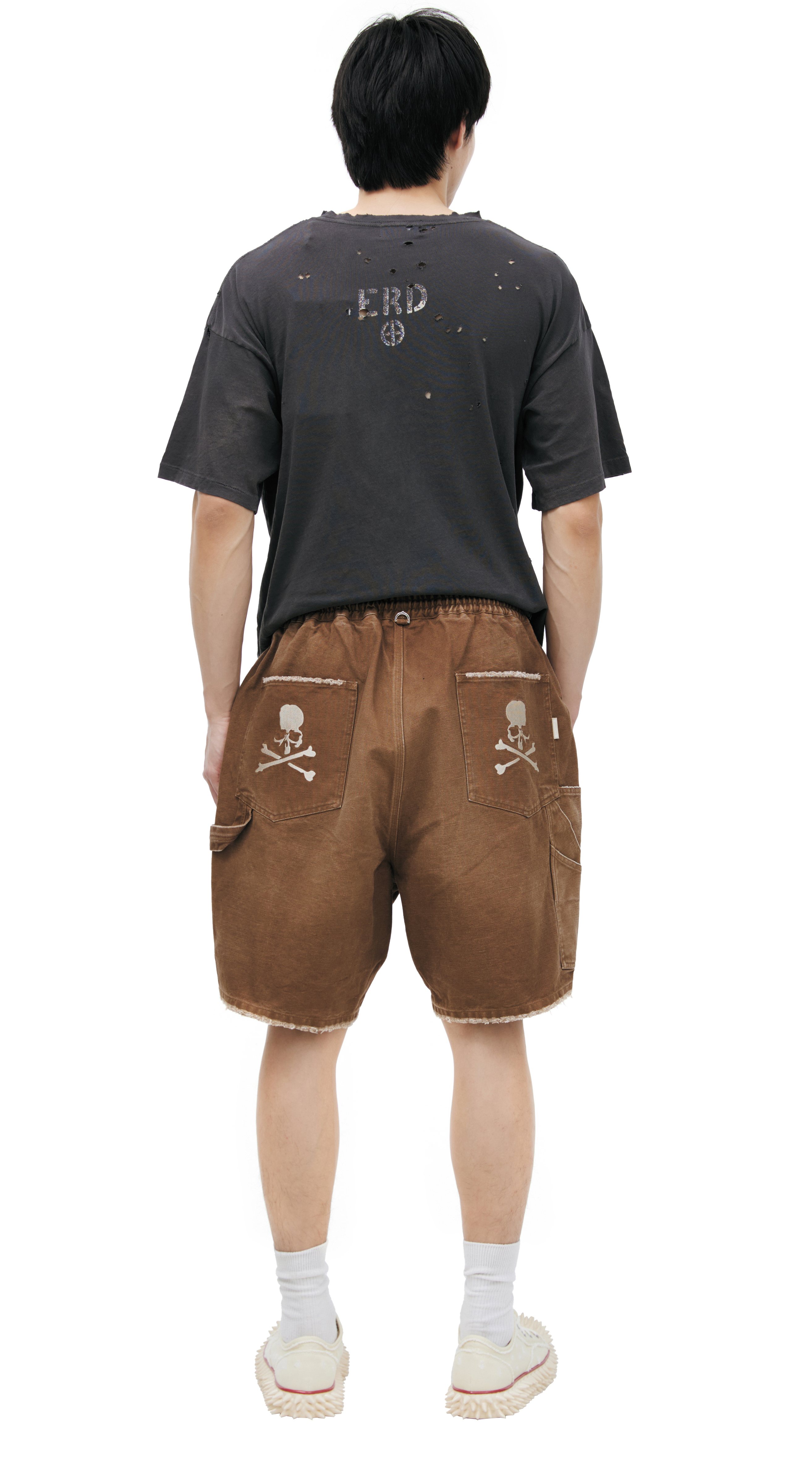 Buy Mastermind WORLD men beige shorts with raw edges for $1,765