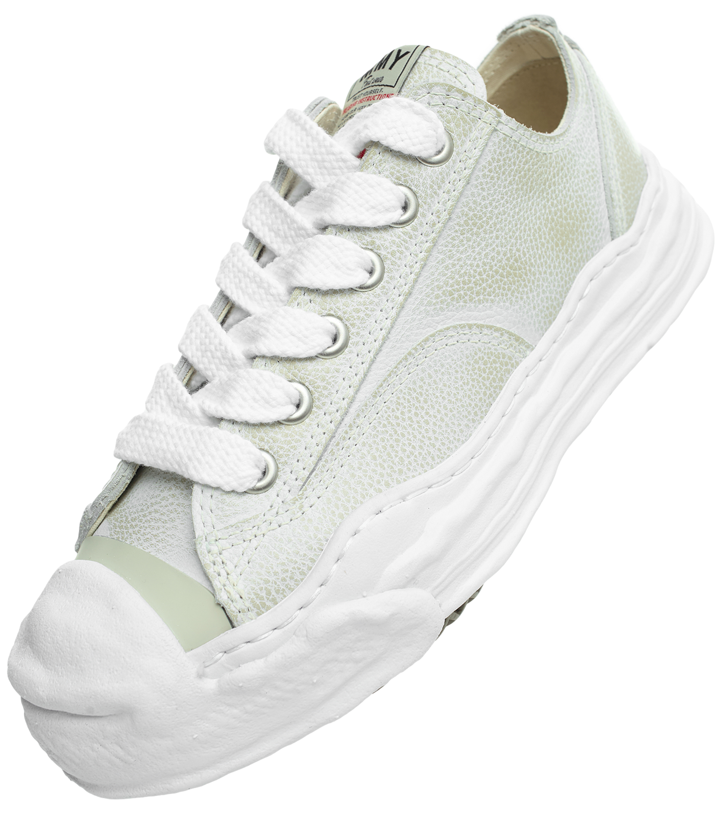 Scuffed leather sneakers
