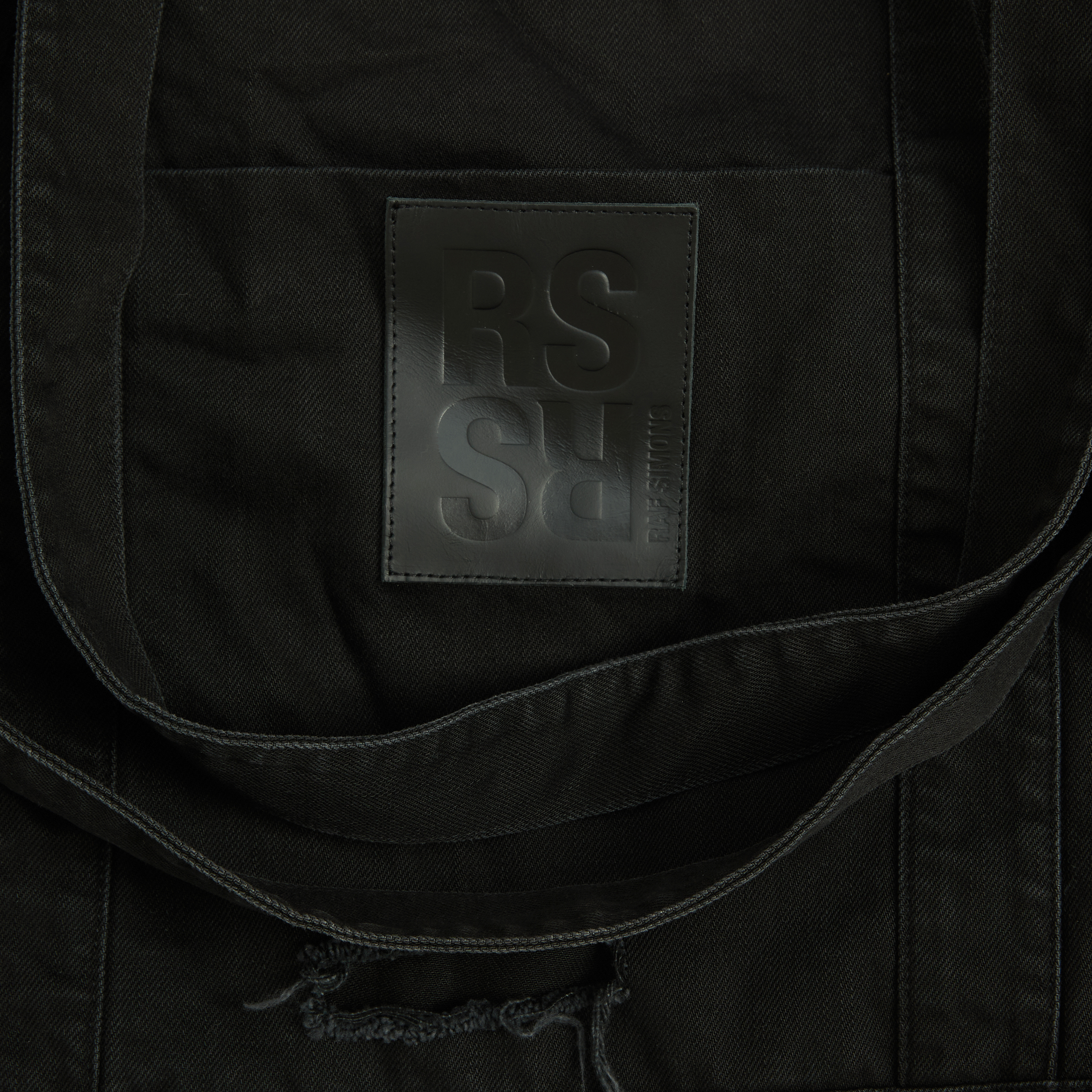 Buy Raf Simons men black ripped logo shopper bag for $644 online