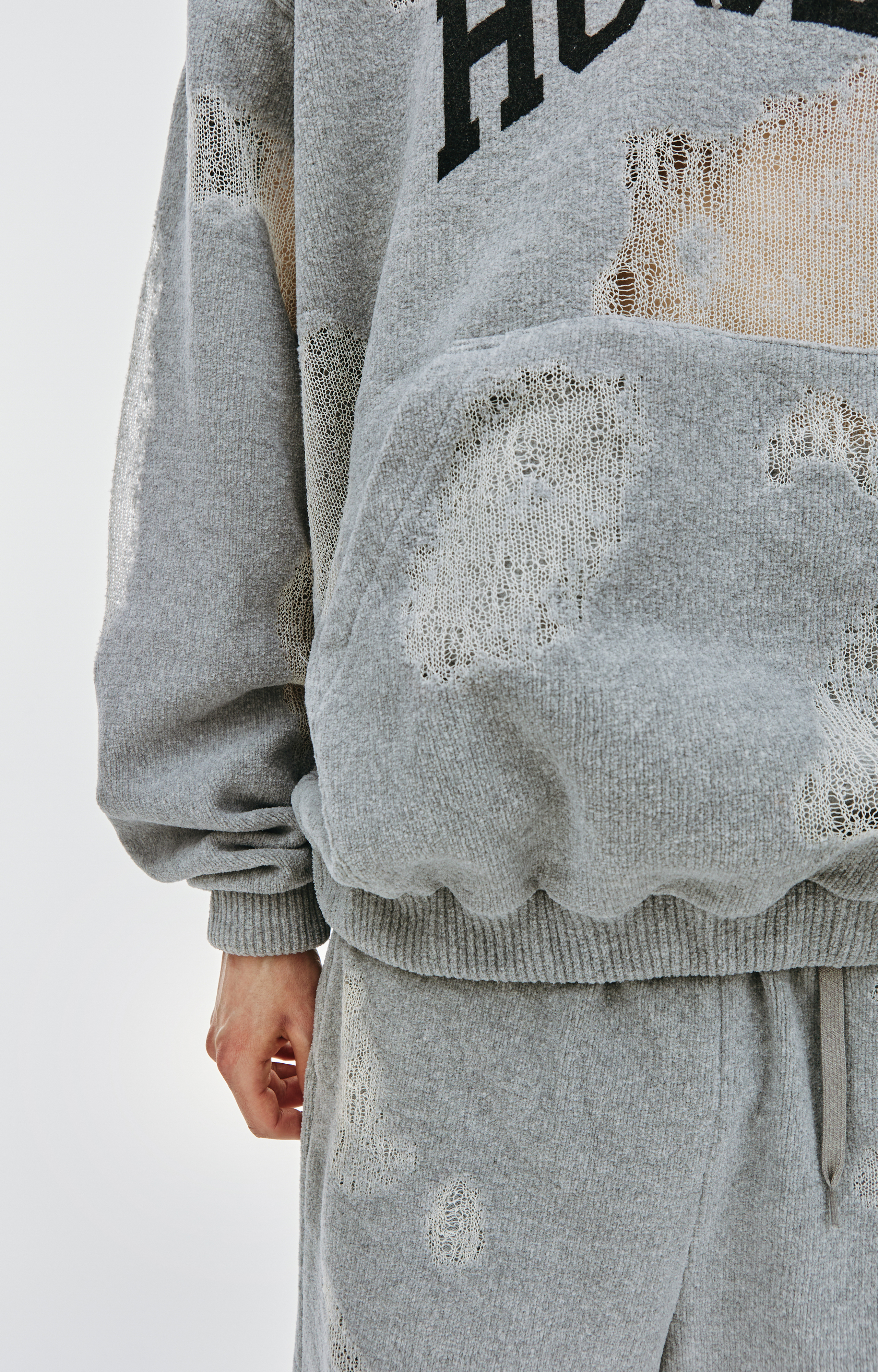 Buy Doublet women grey ripped off knit hoodie for $1,055 online on