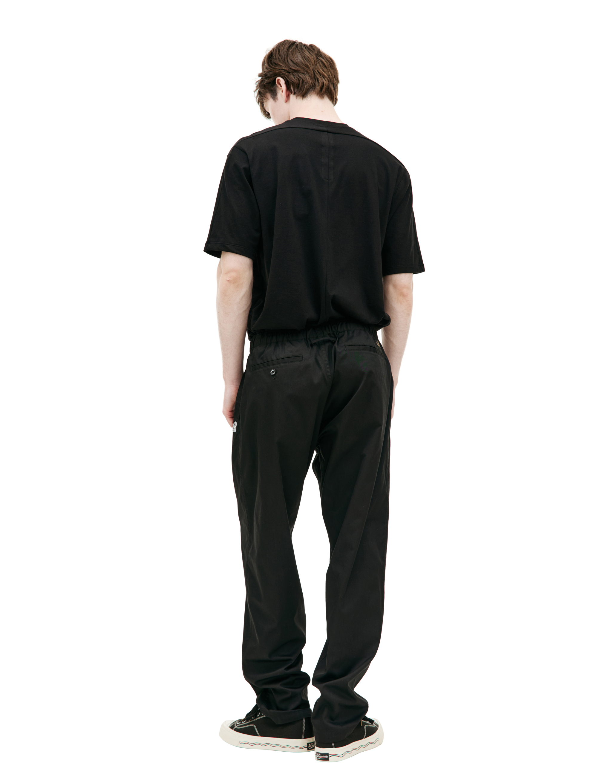 Shop Undercover Embroidered Logo Trousers In Black