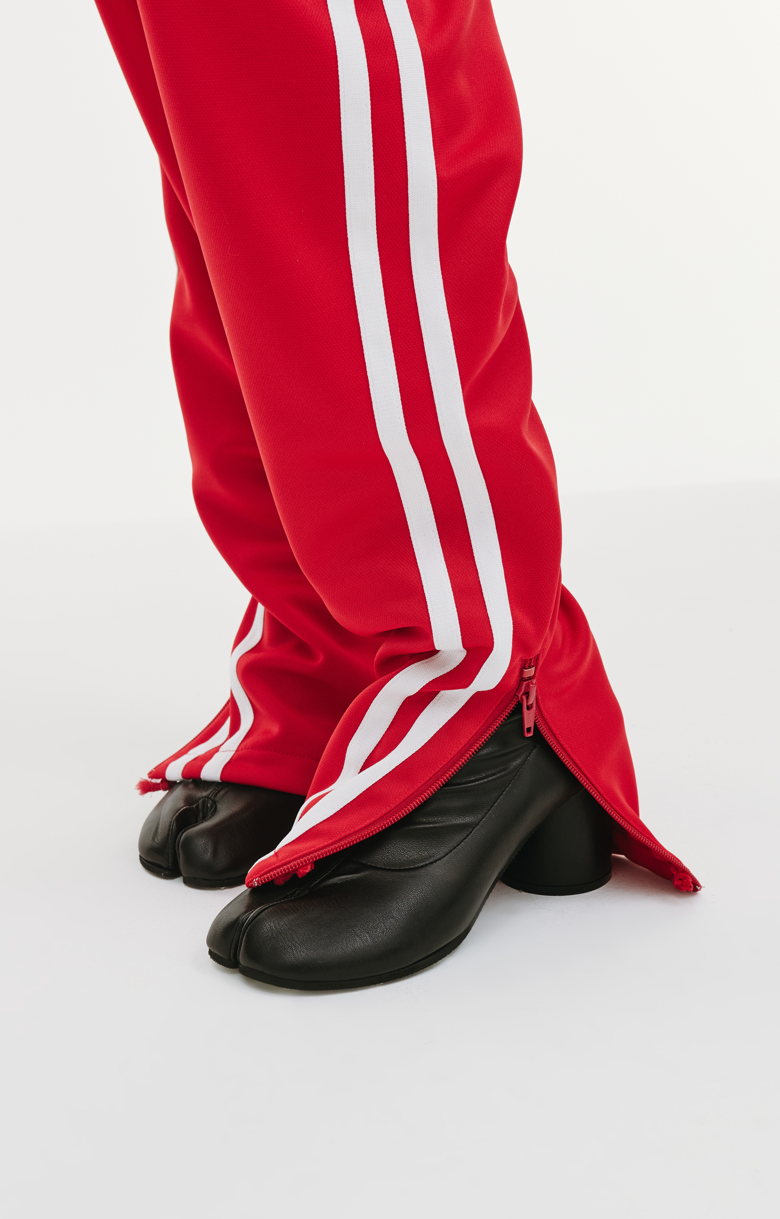 Buy Doublet women red invisible track pants for $246 online on SV77,  23SS42PT231/RED