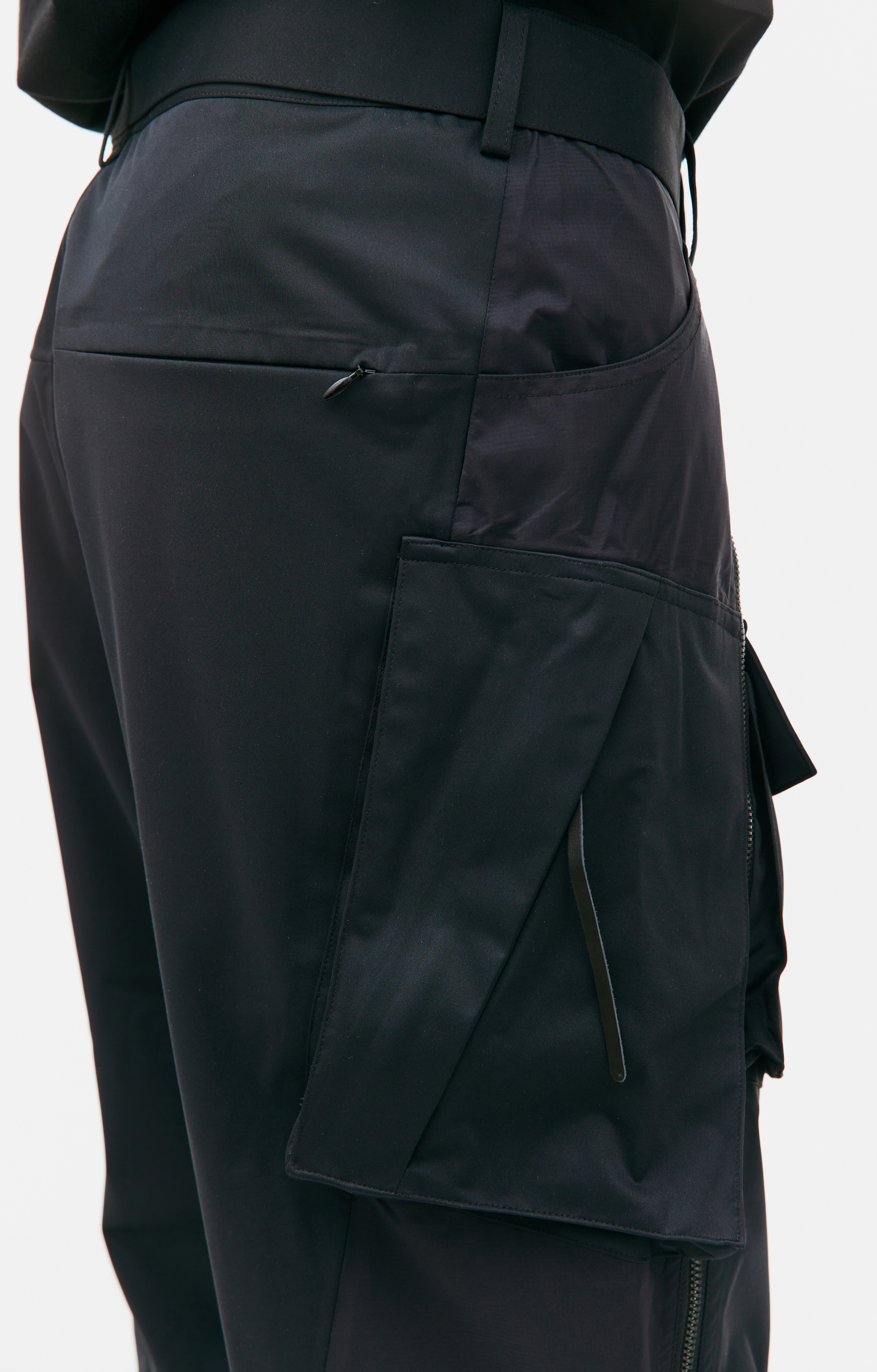 The Viridi-Anne Black zip trousers