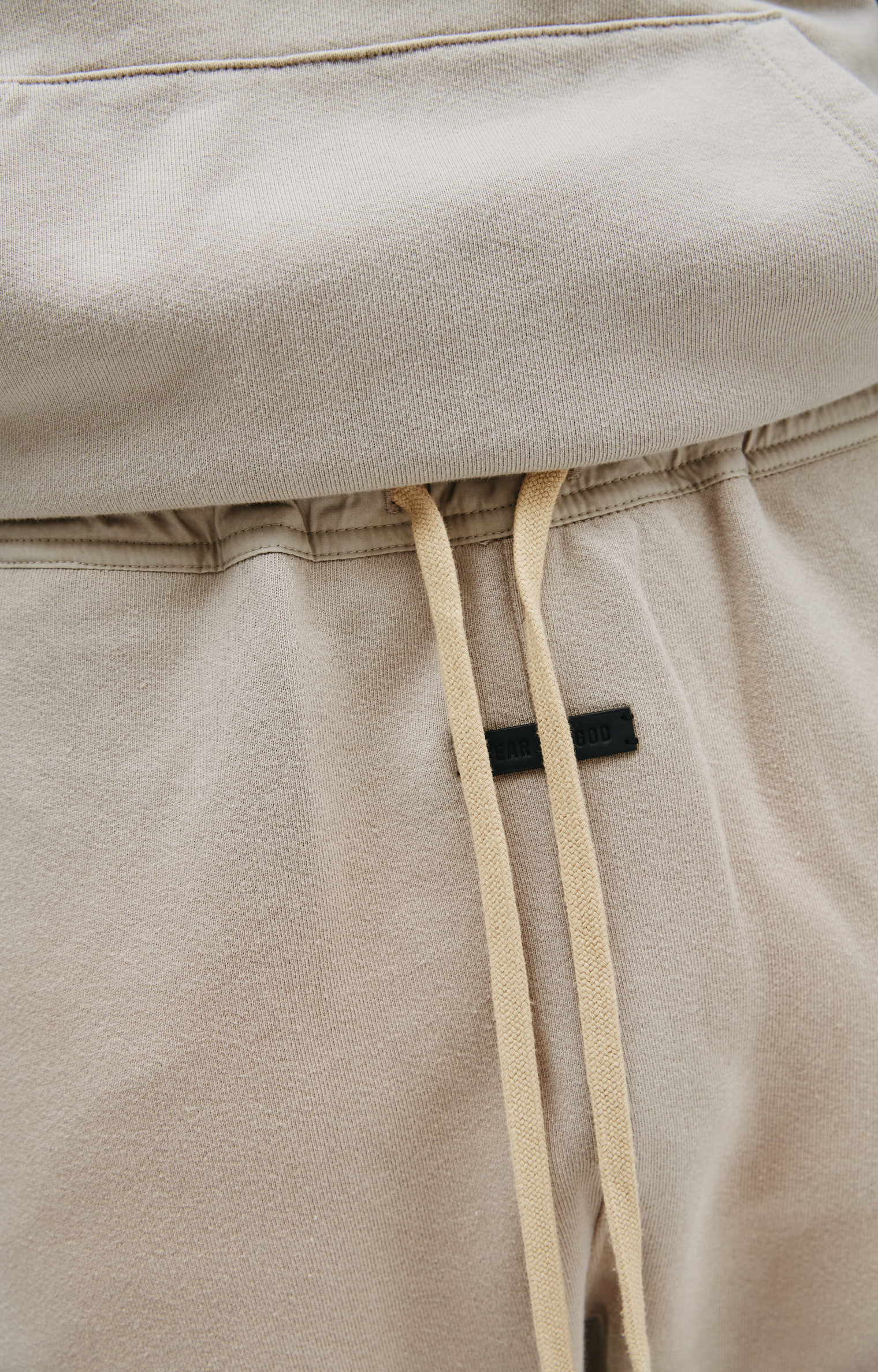 Buy Fear of God men the vintage sweatpant in beige for $655 online