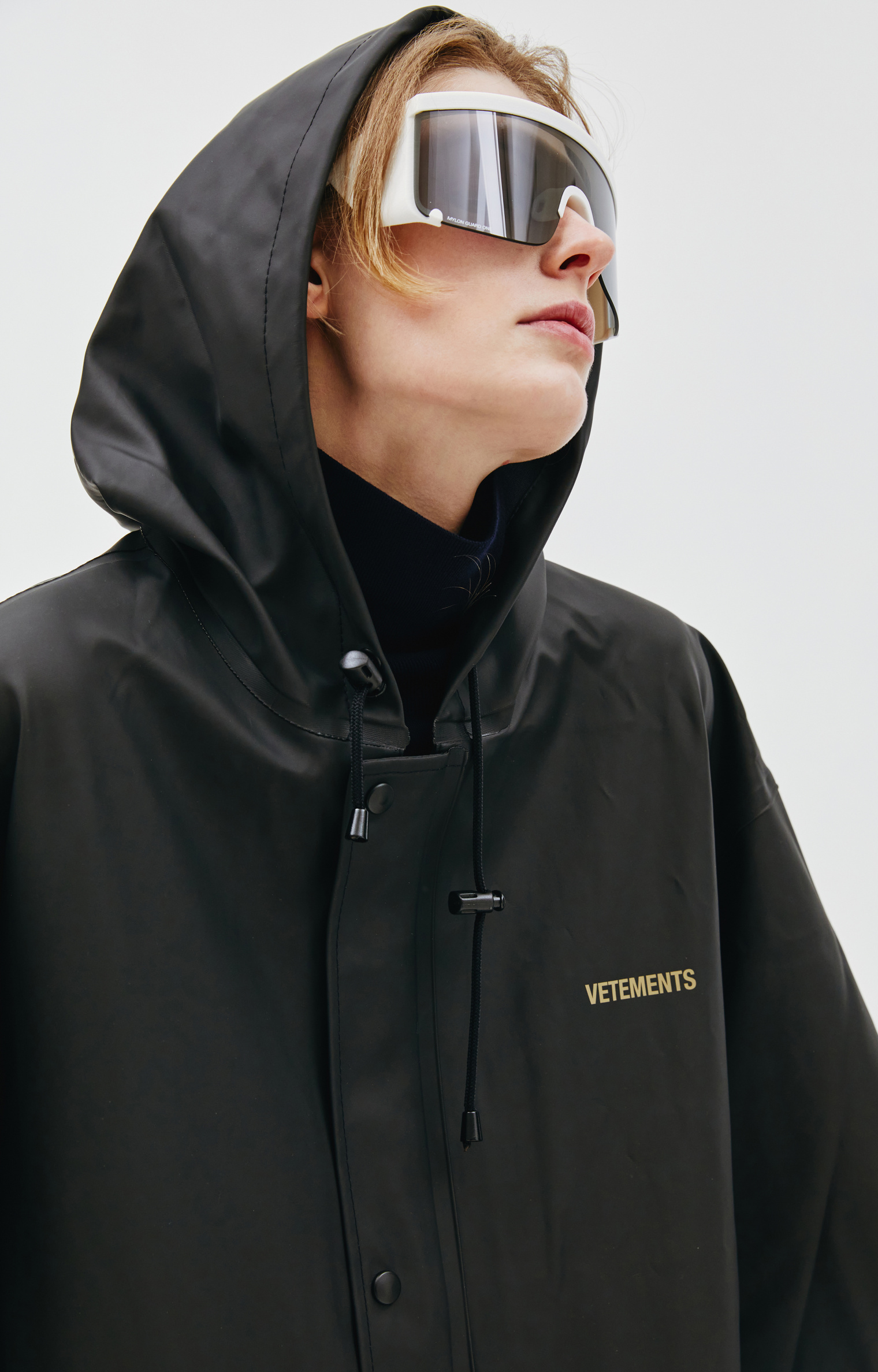 VETEMENTS Black rain coat with logo