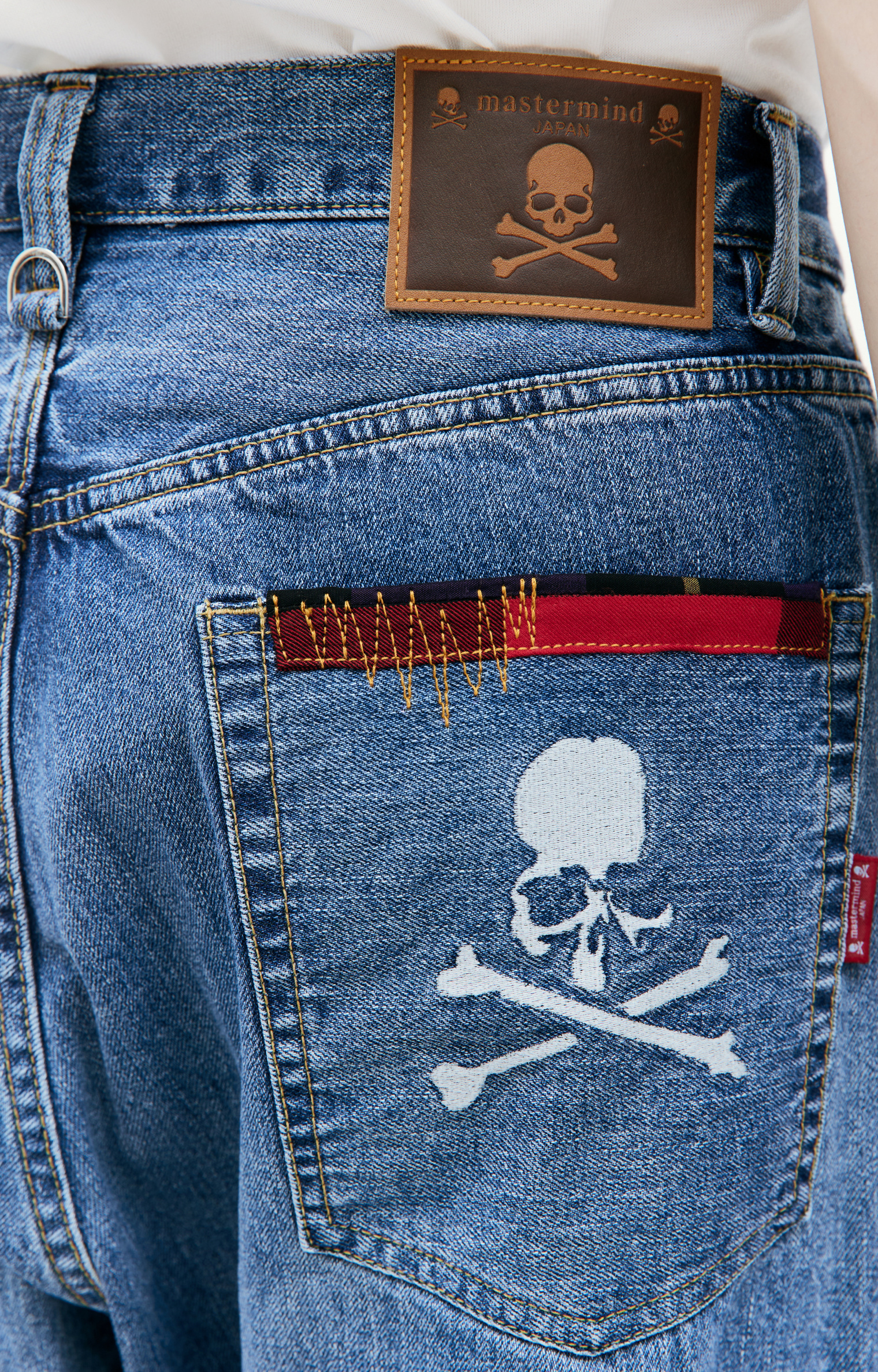 Mastermind WORLD Blue embroidered jeans