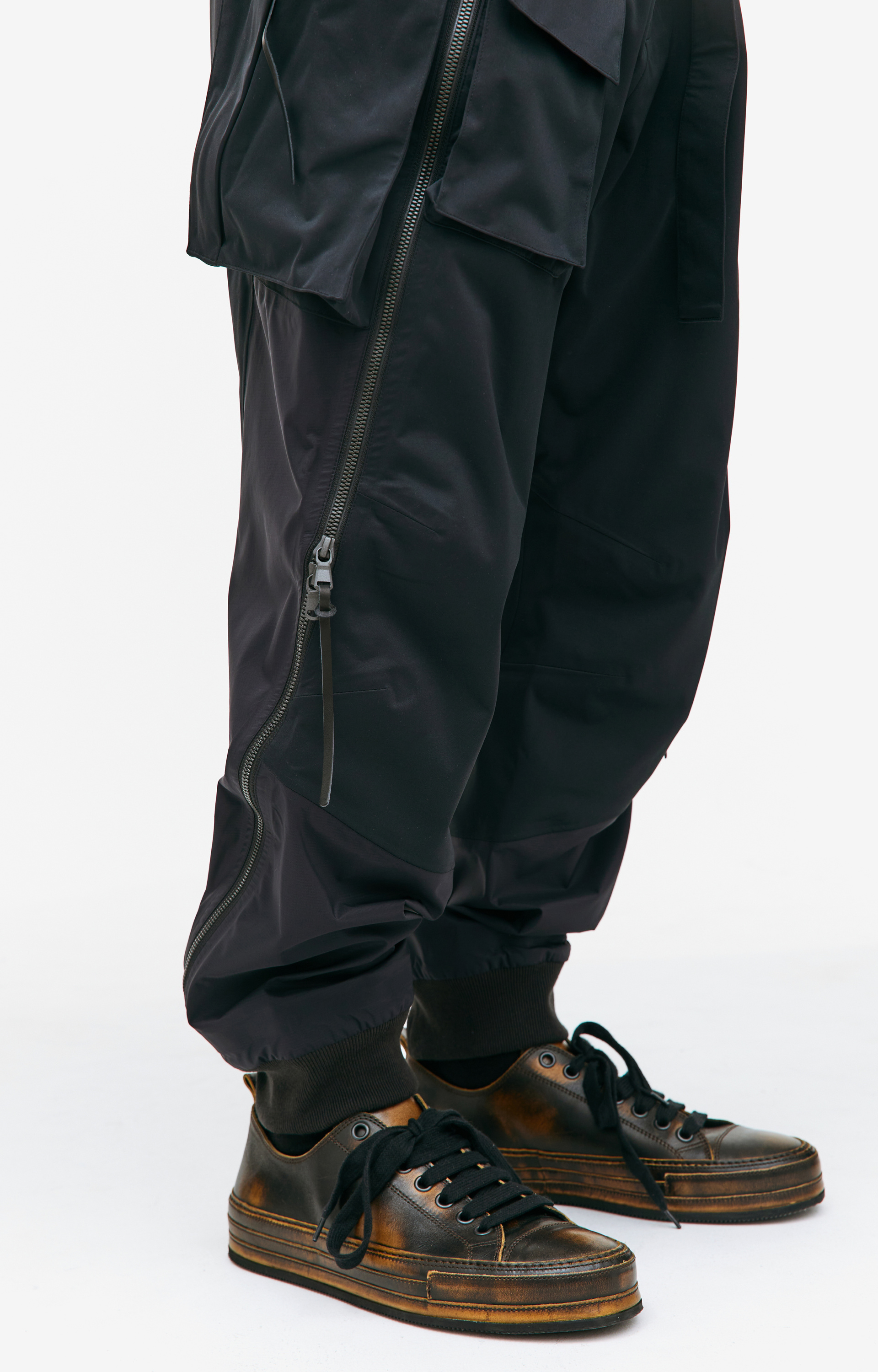 The Viridi-Anne Black zip trousers