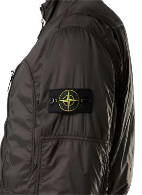 Stone Island Jumpsuit with a patch on the sleeve