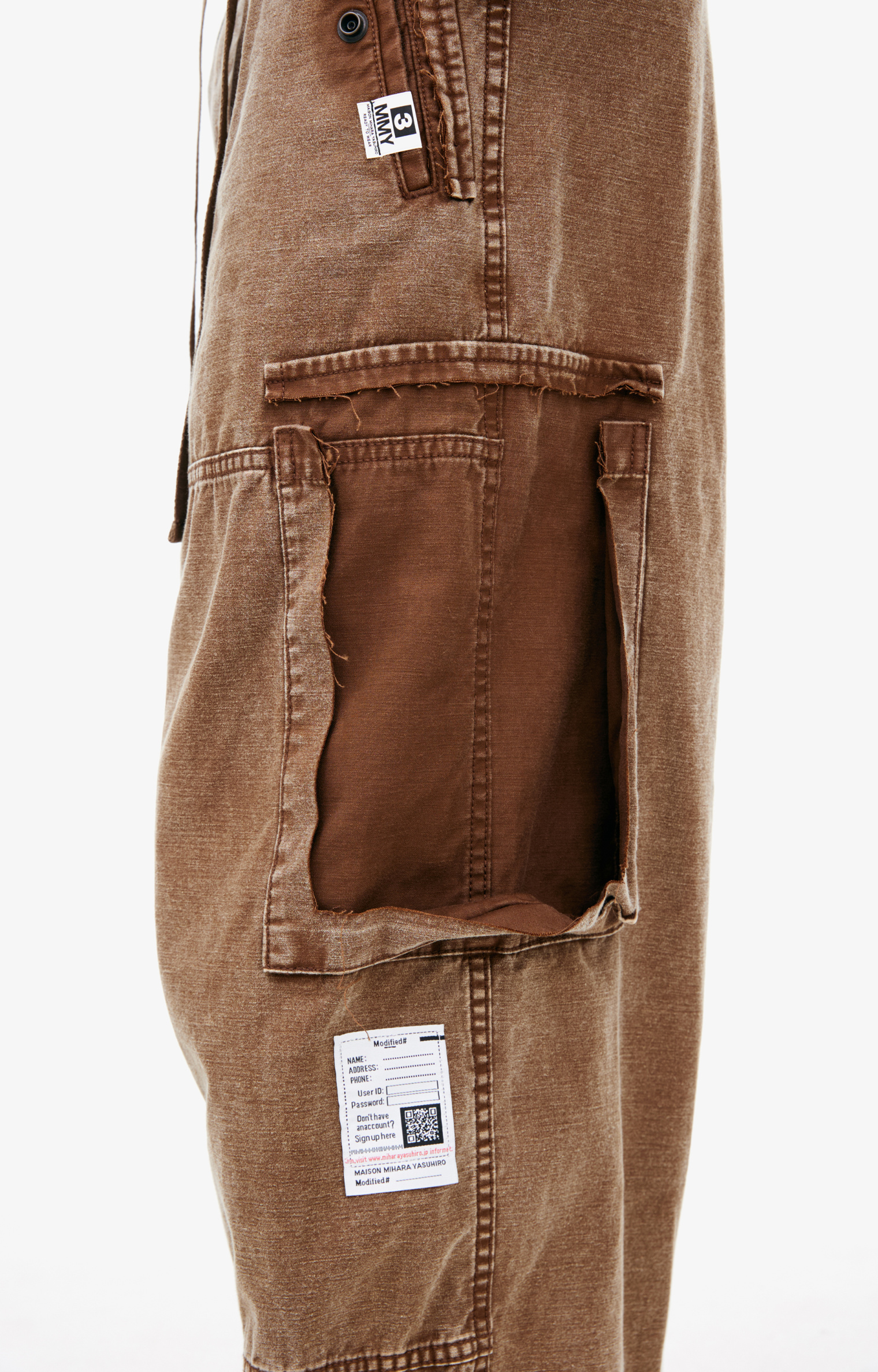 Buy Maison Mihara Yasuhiro men brown cargo trousers with a ripped 