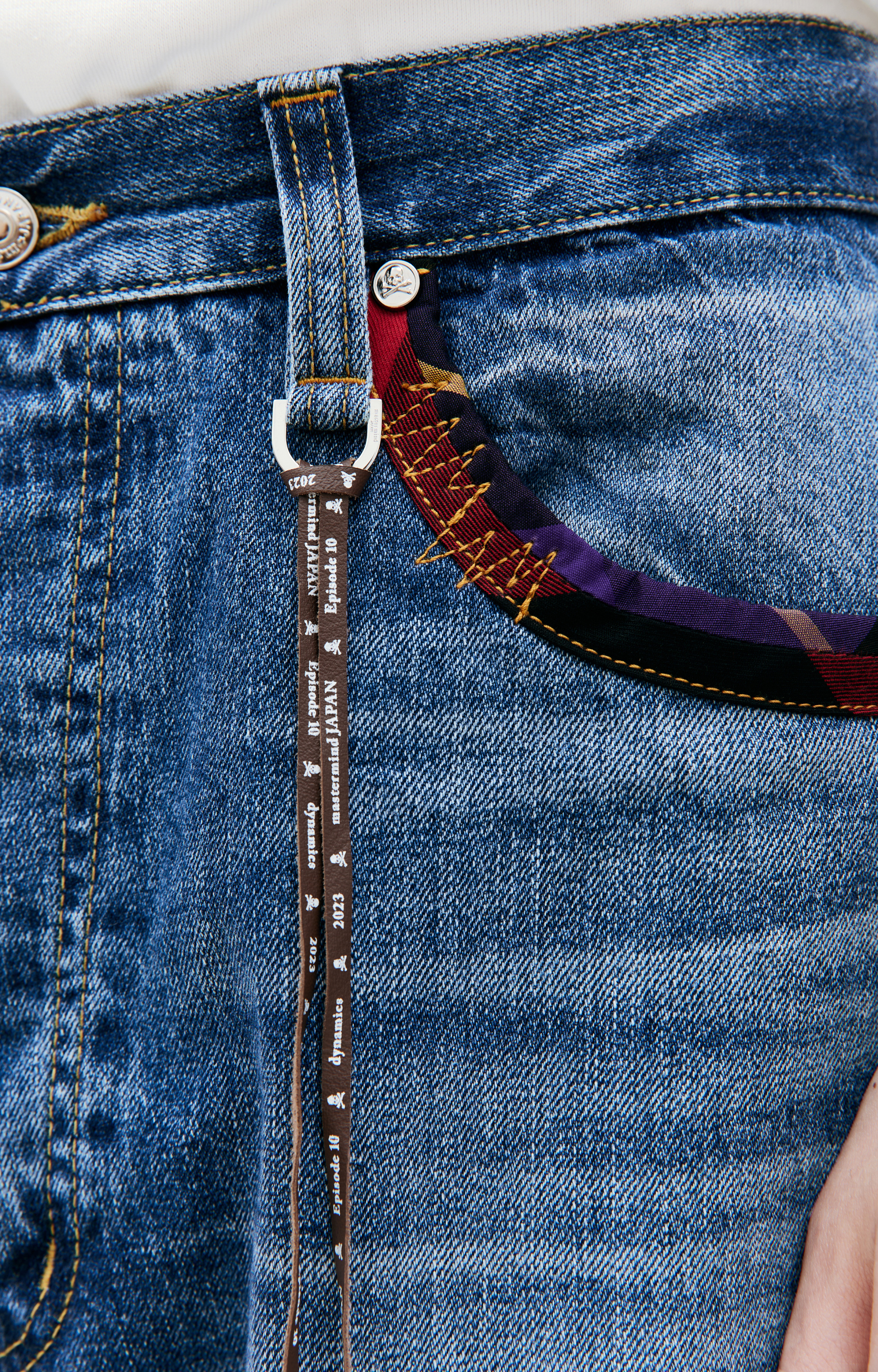 Mastermind WORLD Blue embroidered jeans