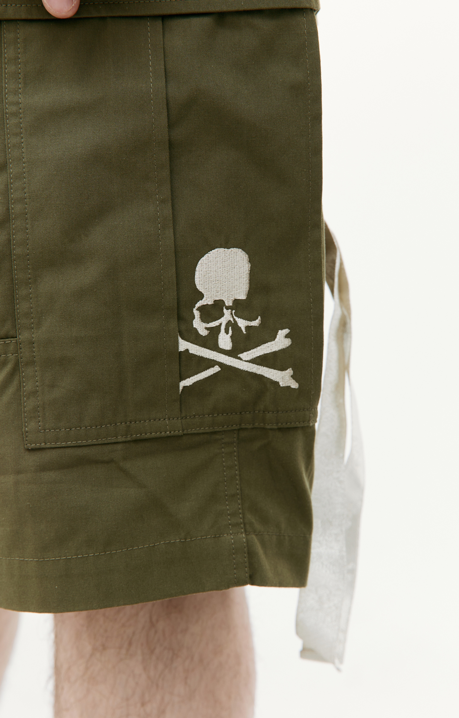 Buy Mastermind WORLD men khaki cargo shorts for $1,155 online on