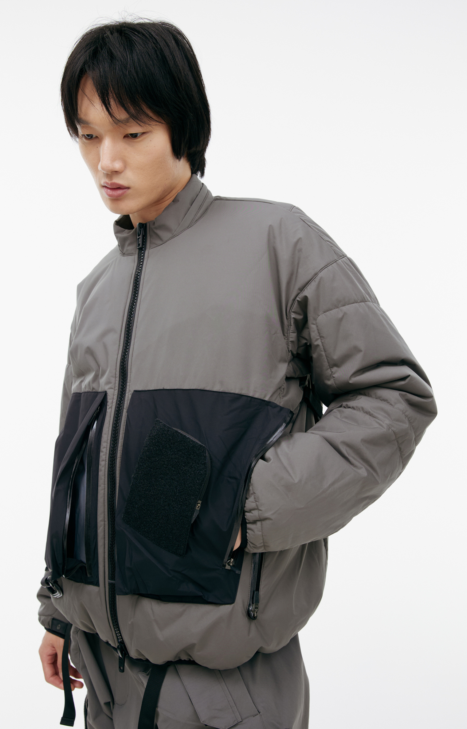 Acronym Grey jacket with patch pockets