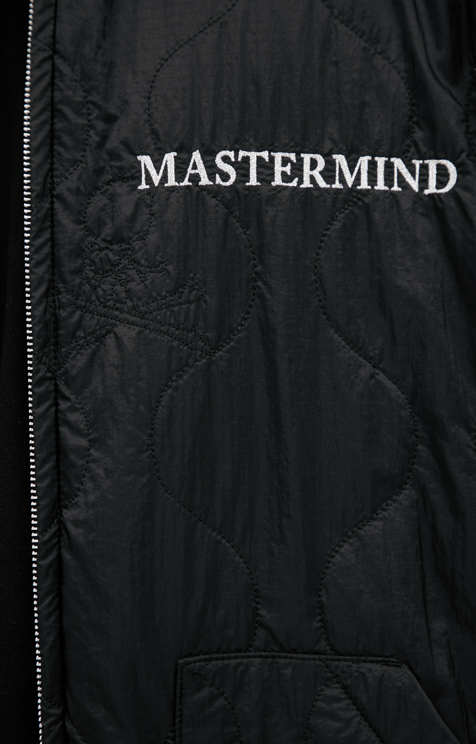 Mastermind WORLD Quilted jacket with logo