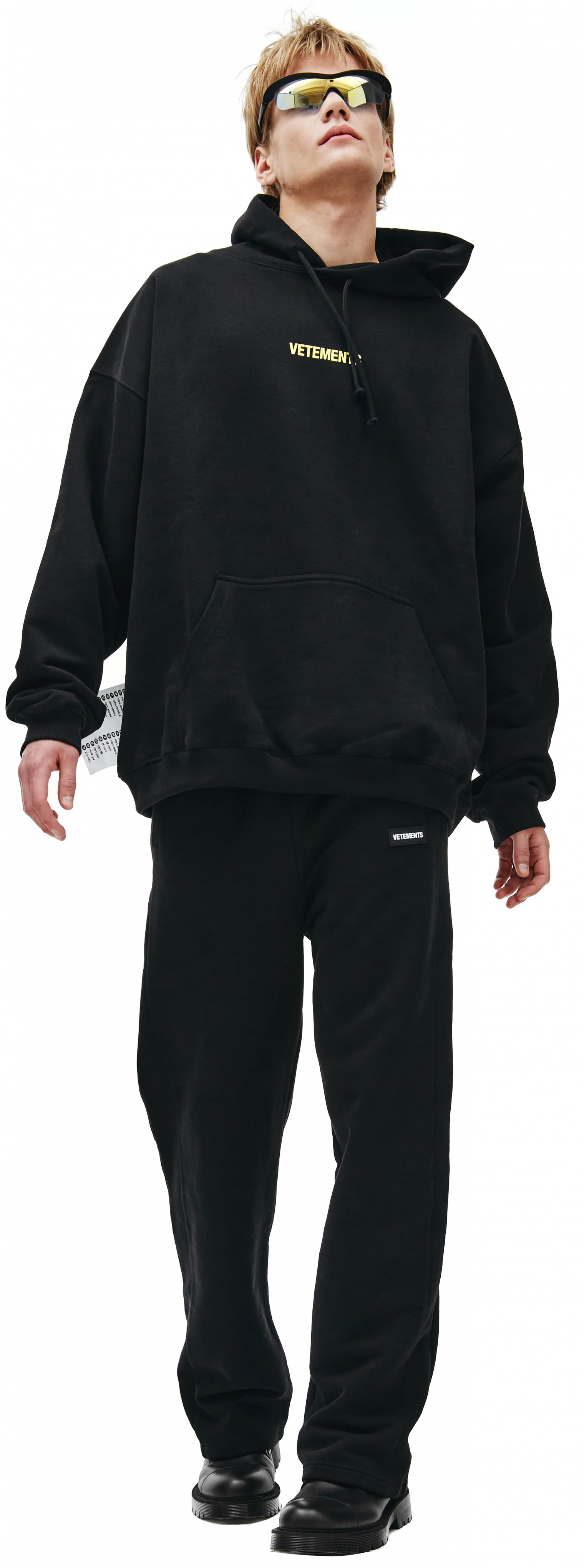 Buy VETEMENTS men logo label hoodie in black for $518 online on