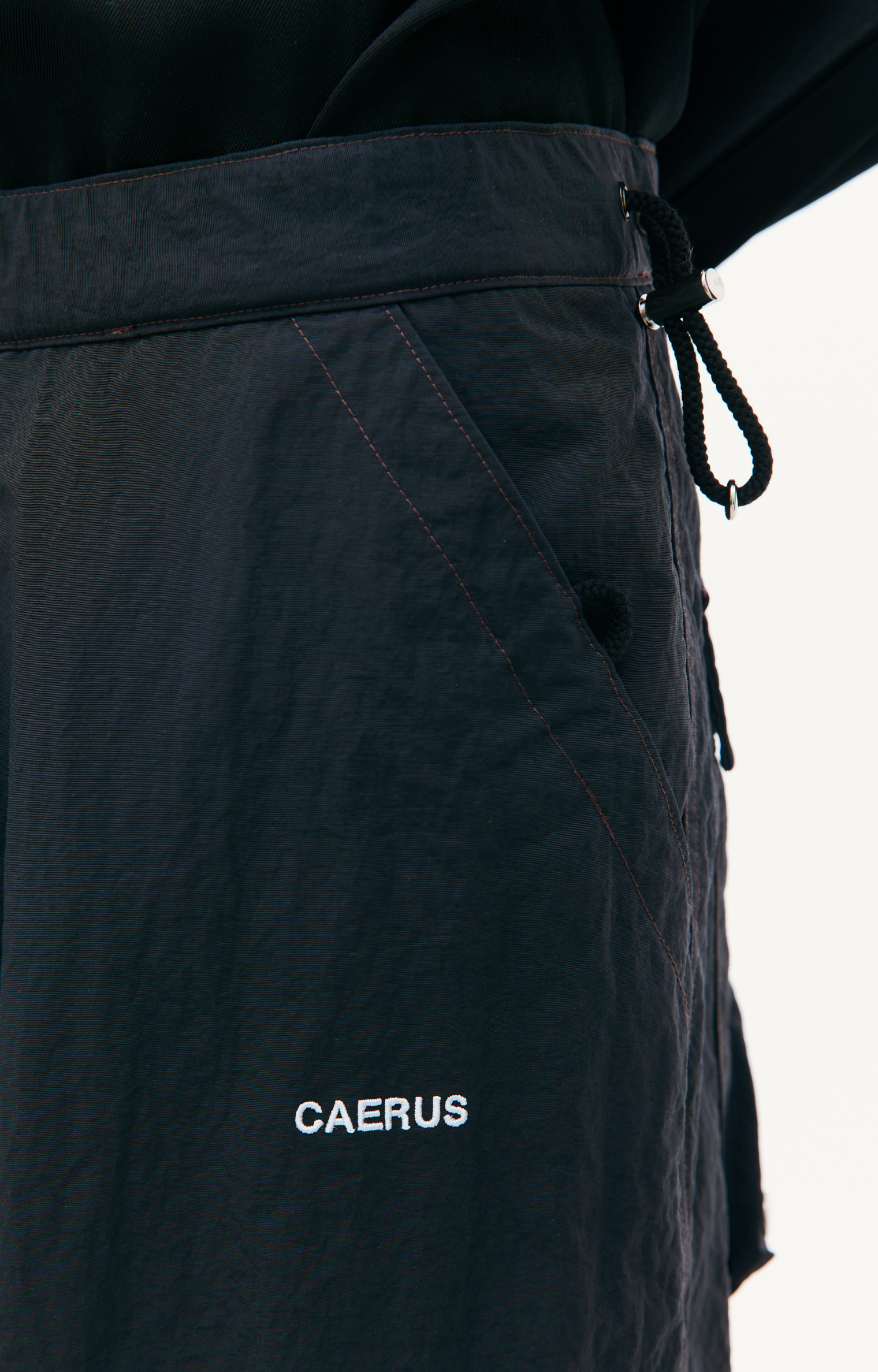 CAERUS Black nylon trousers