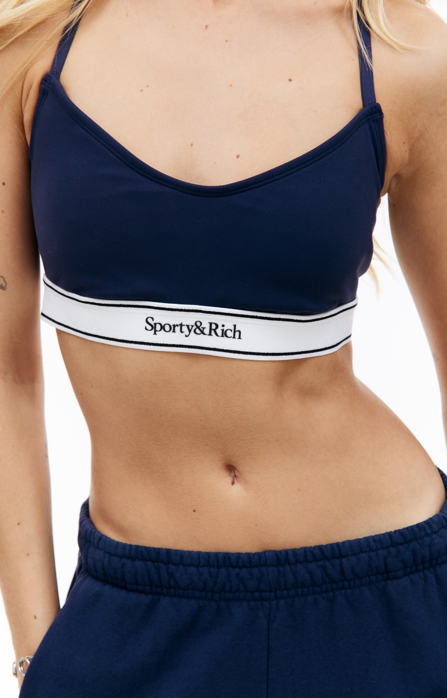 SPORTY & RICH Serif logo sports bra