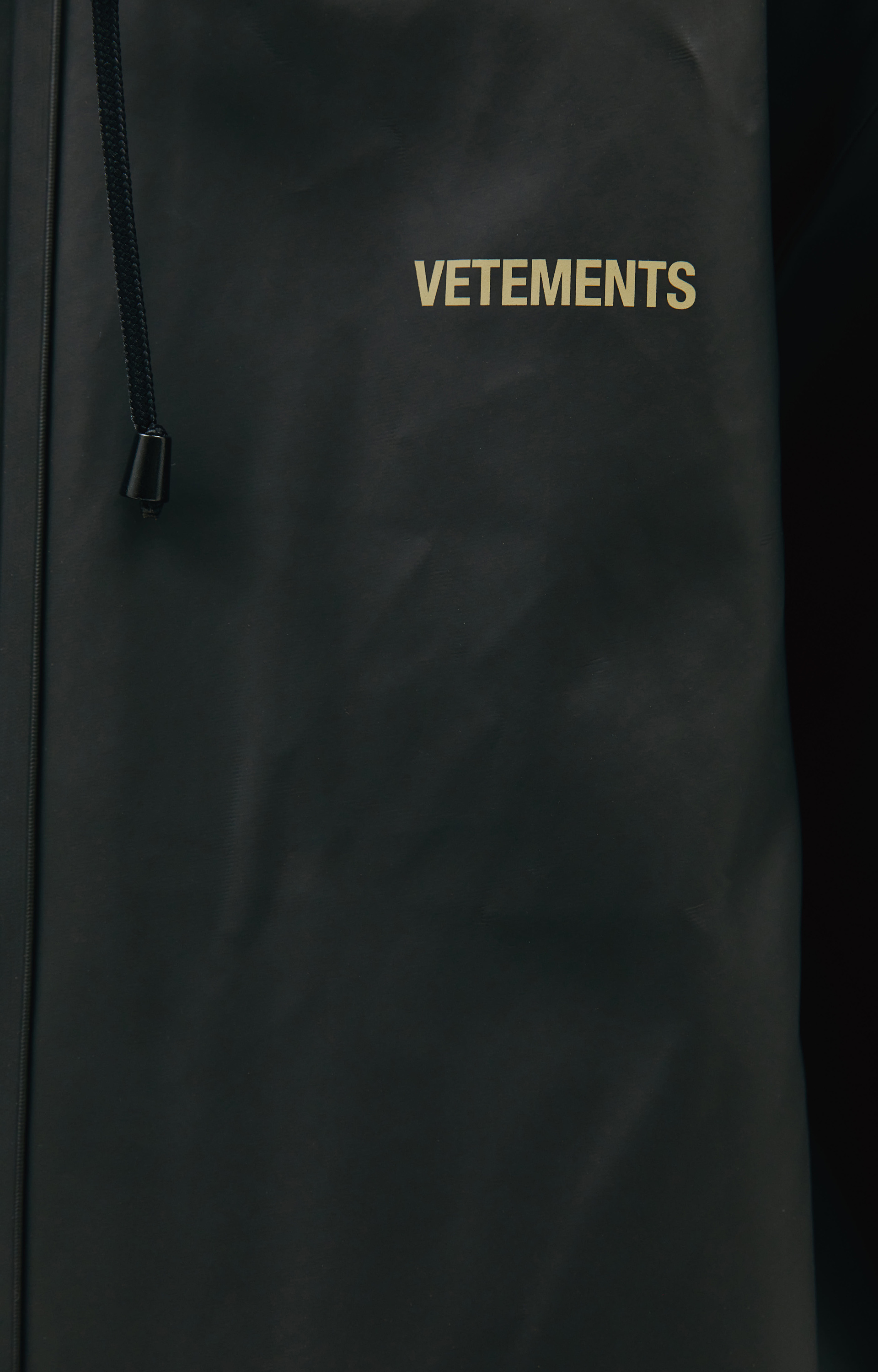 VETEMENTS Black rain coat with logo