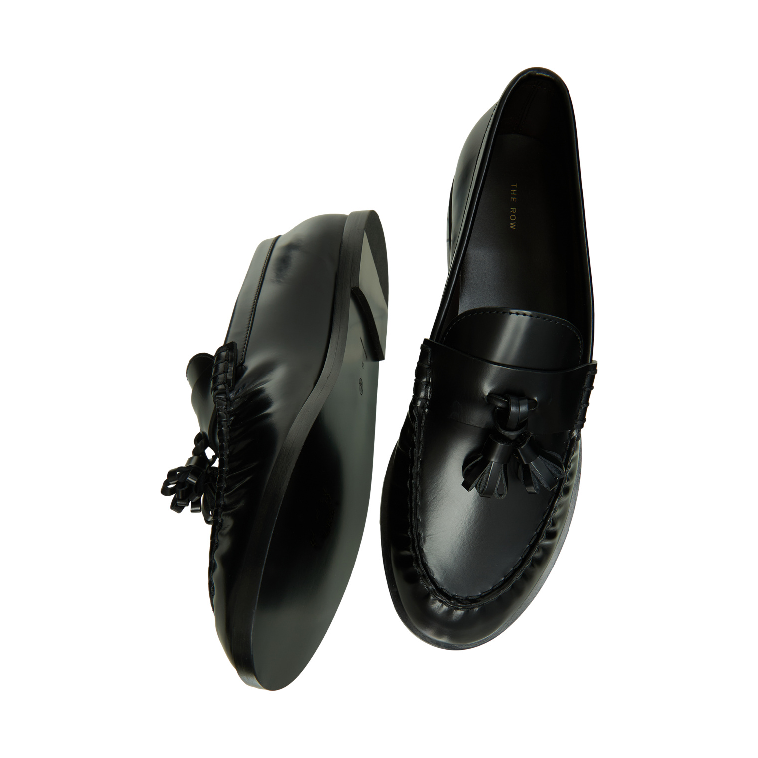 The Row Black leather loafers