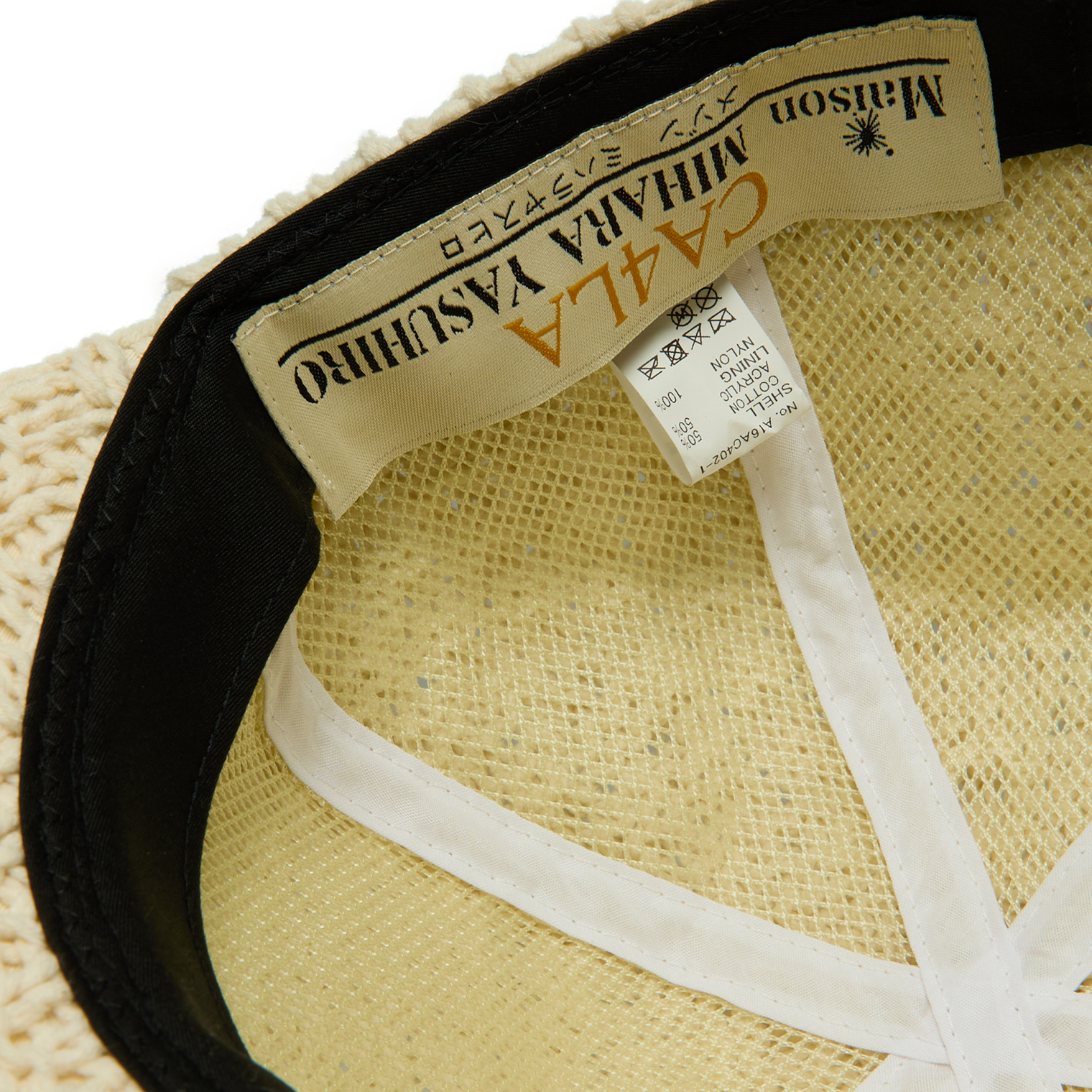 Buy Maison Mihara Yasuhiro men beige la knit cap for $500 online 
