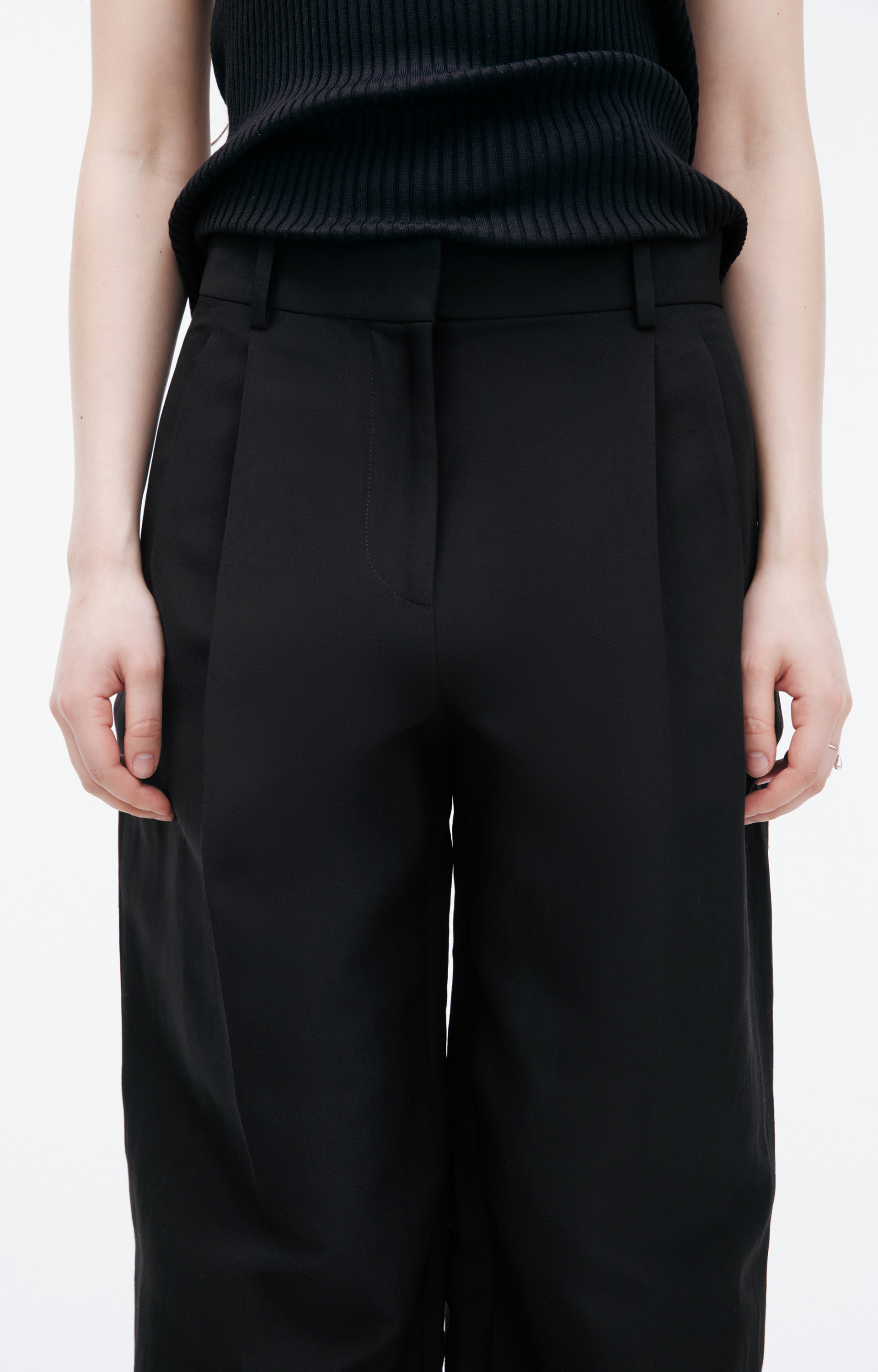 The Row Black arrow trousers