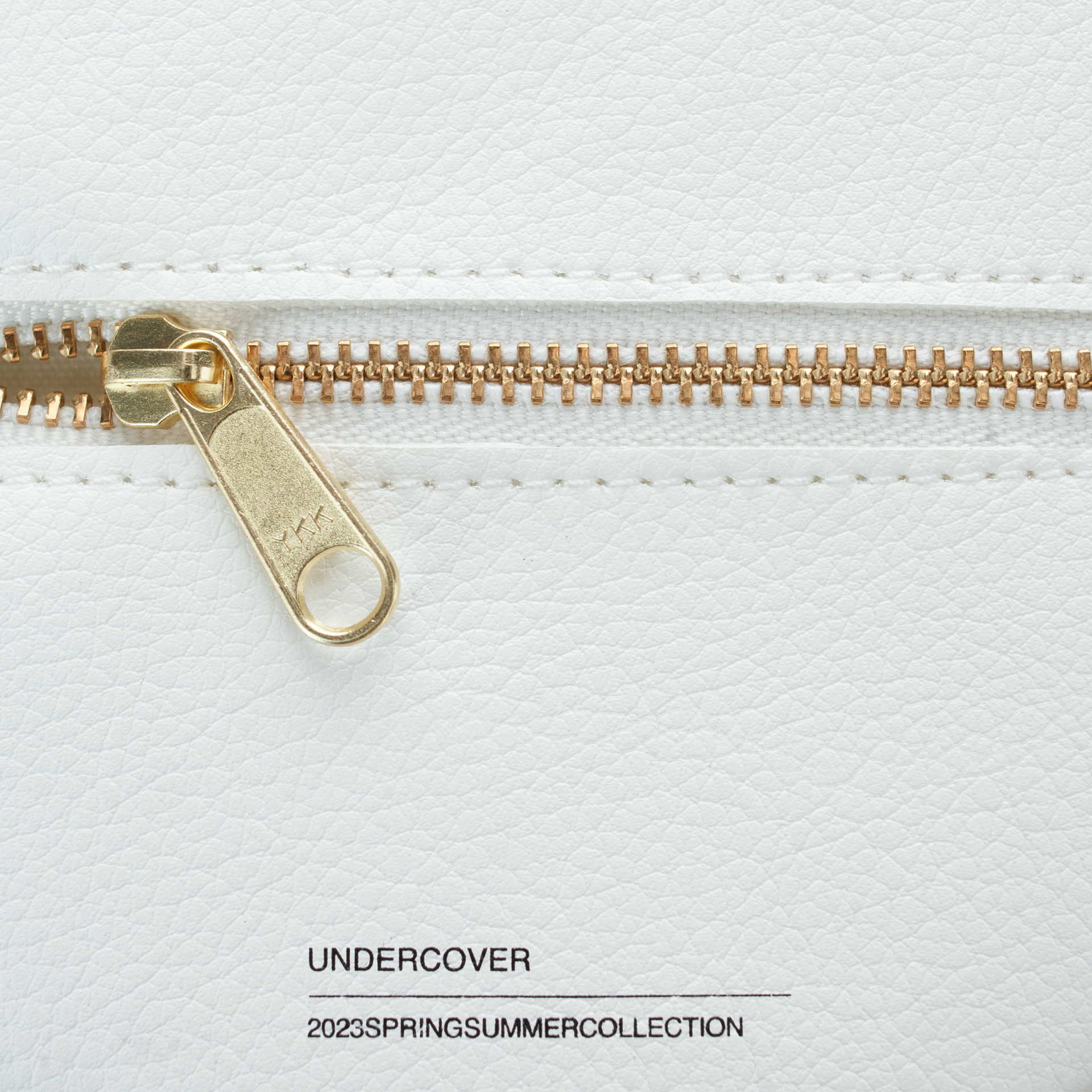 Undercover Donut faux-leather pouch