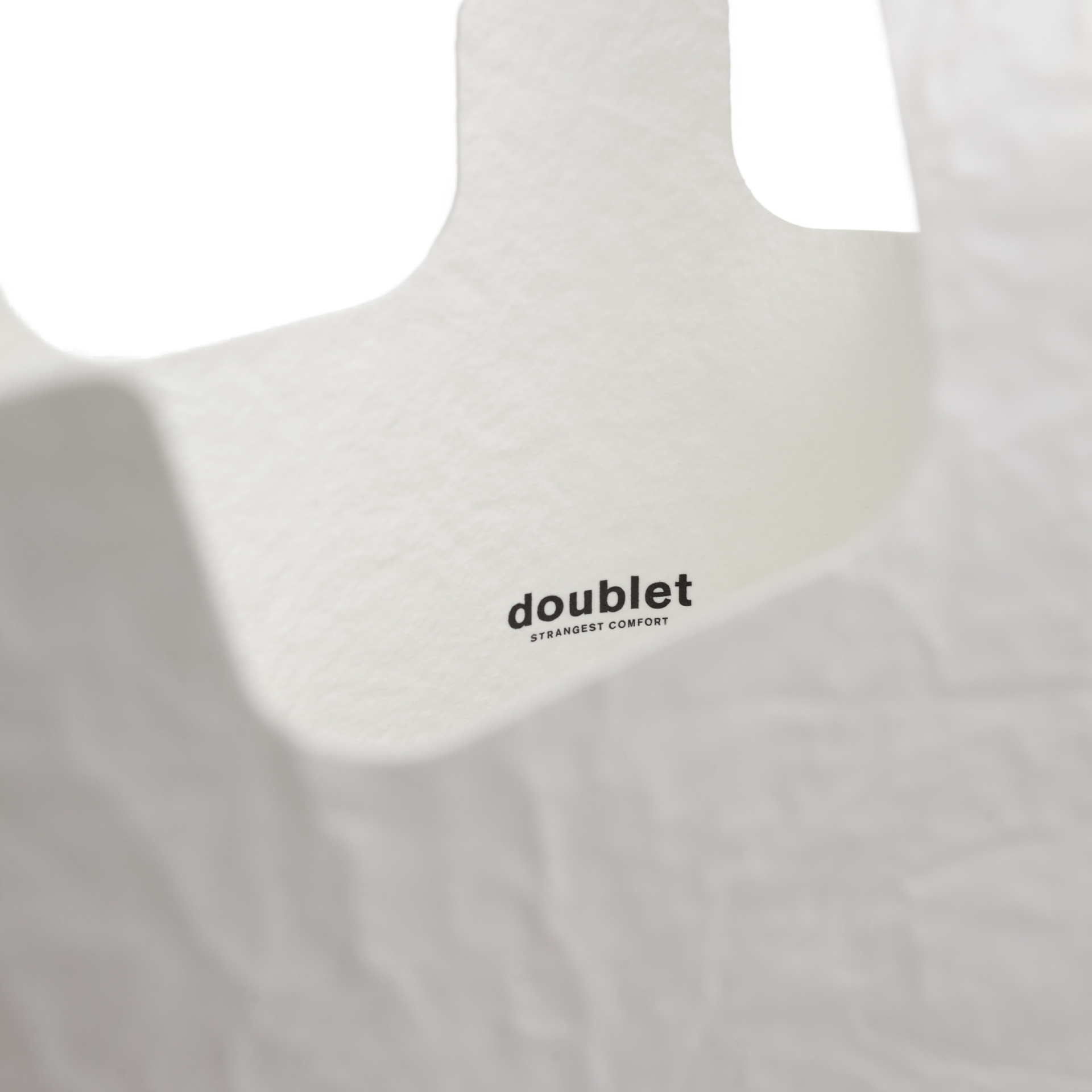Doublet bag in the shape of a package