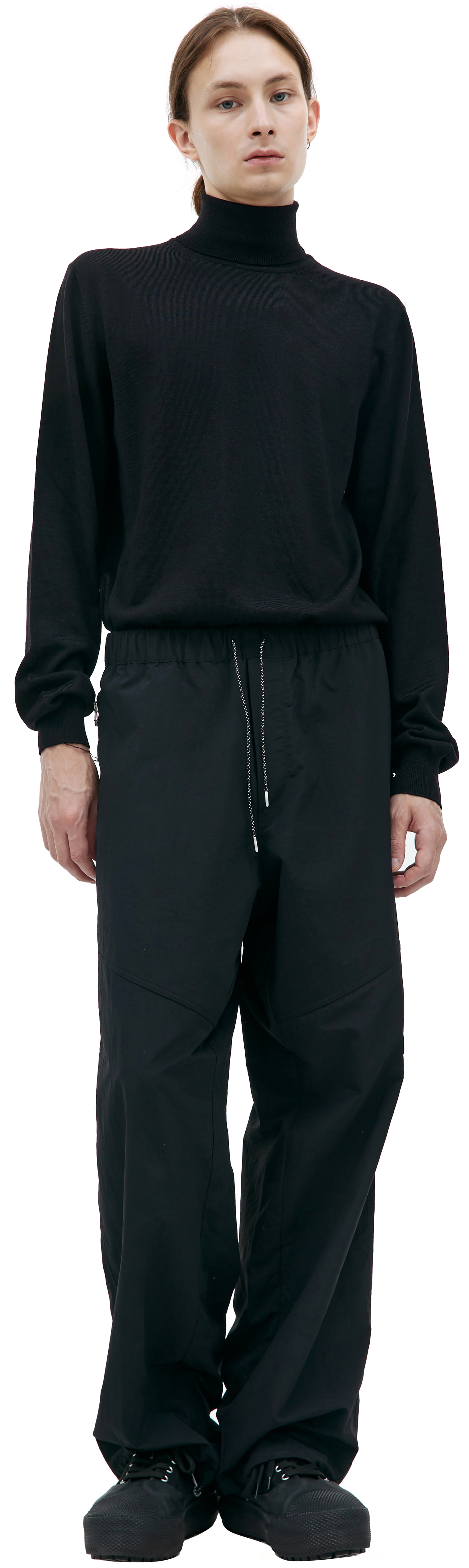 Buy OAMC men black nylon drawstring trousers for $500 online on