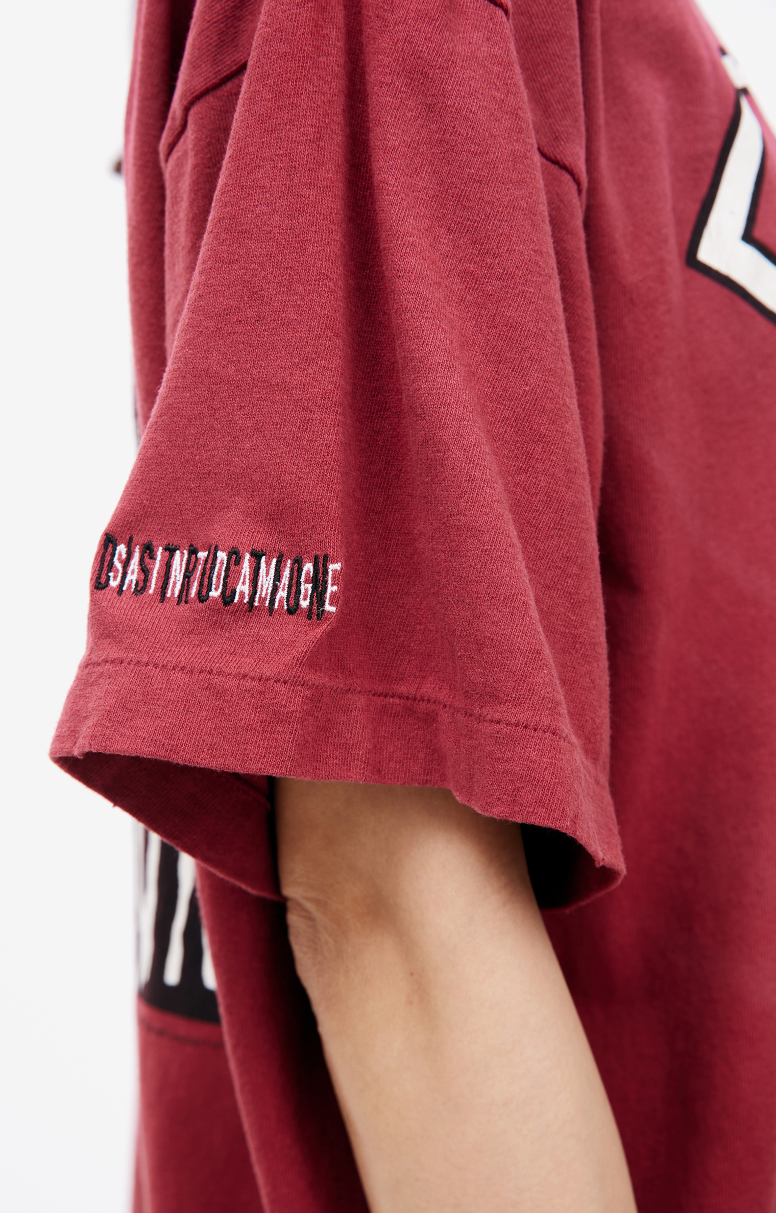 Saint Mxxxxxx T-shirt with a ripped effect