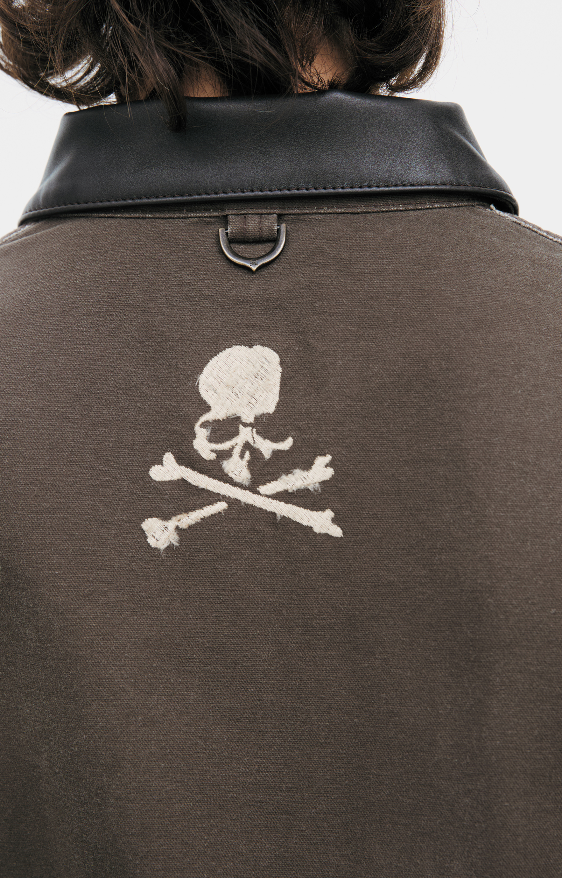 Mastermind WORLD Brown jacket with a skull logo