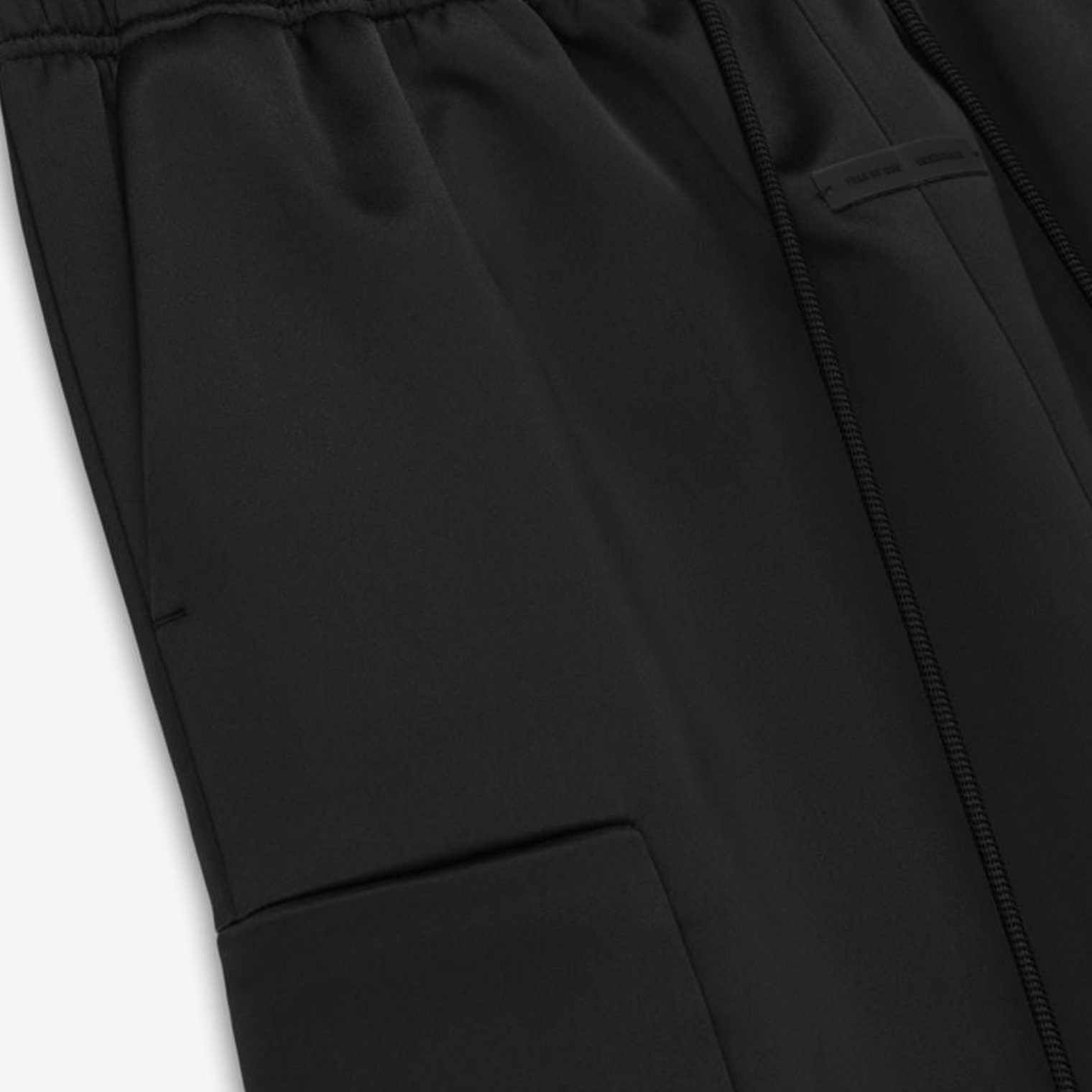 Buy Fear of God Essentials women bonded satin field pants for $200 