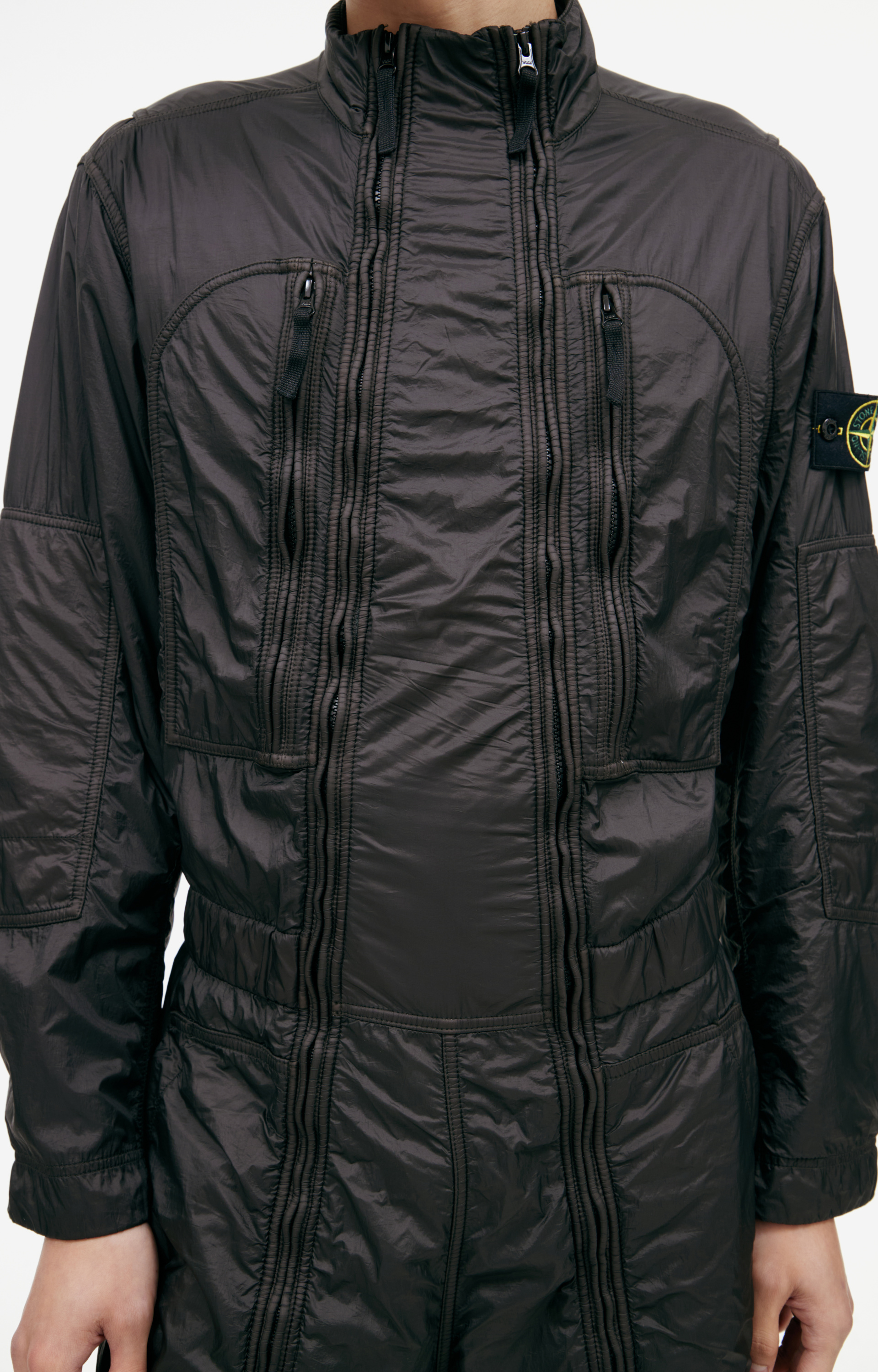 Stone Island Jumpsuit with a patch on the sleeve