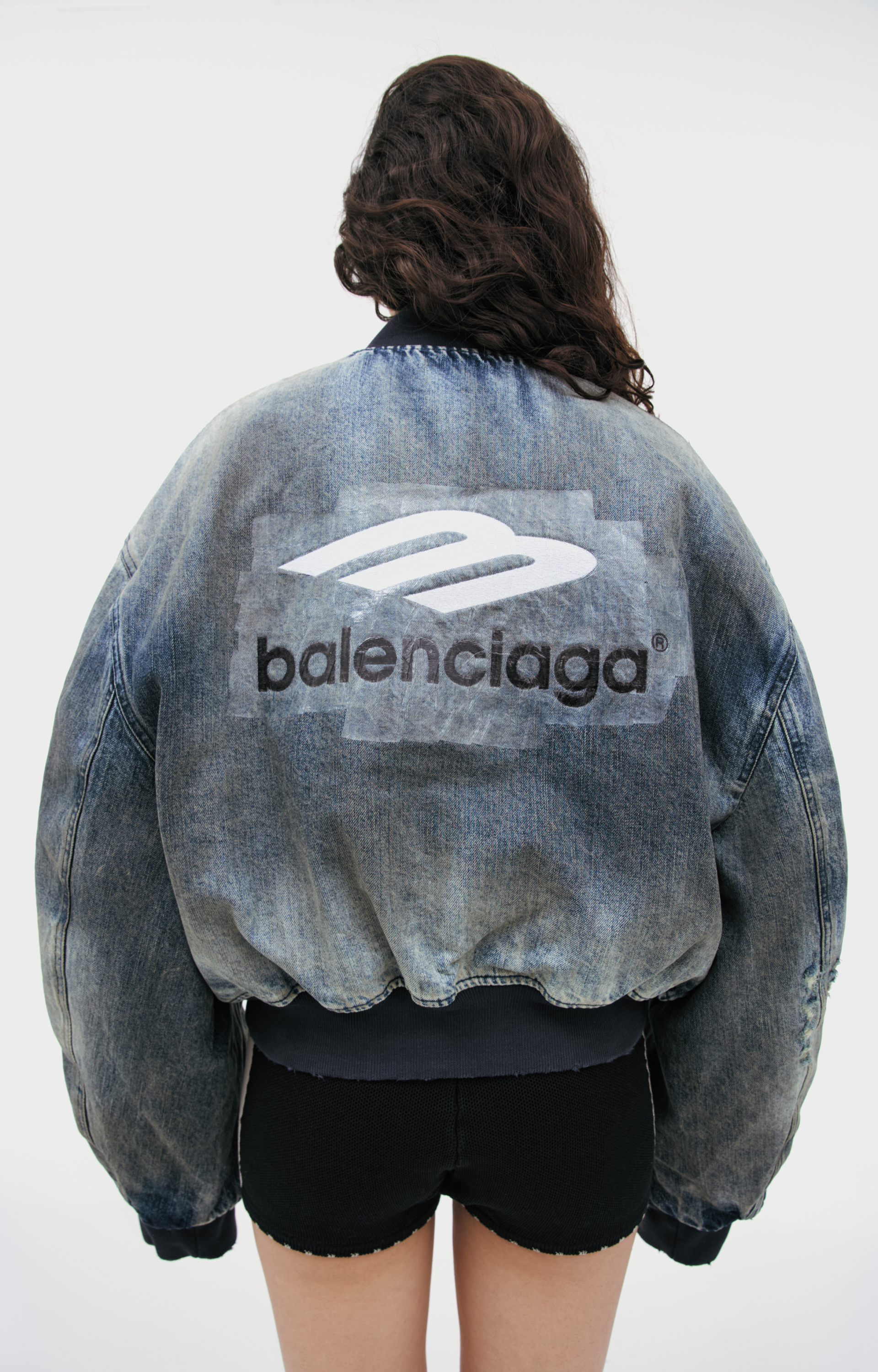 Balenciaga Distressed denim bomber jacket