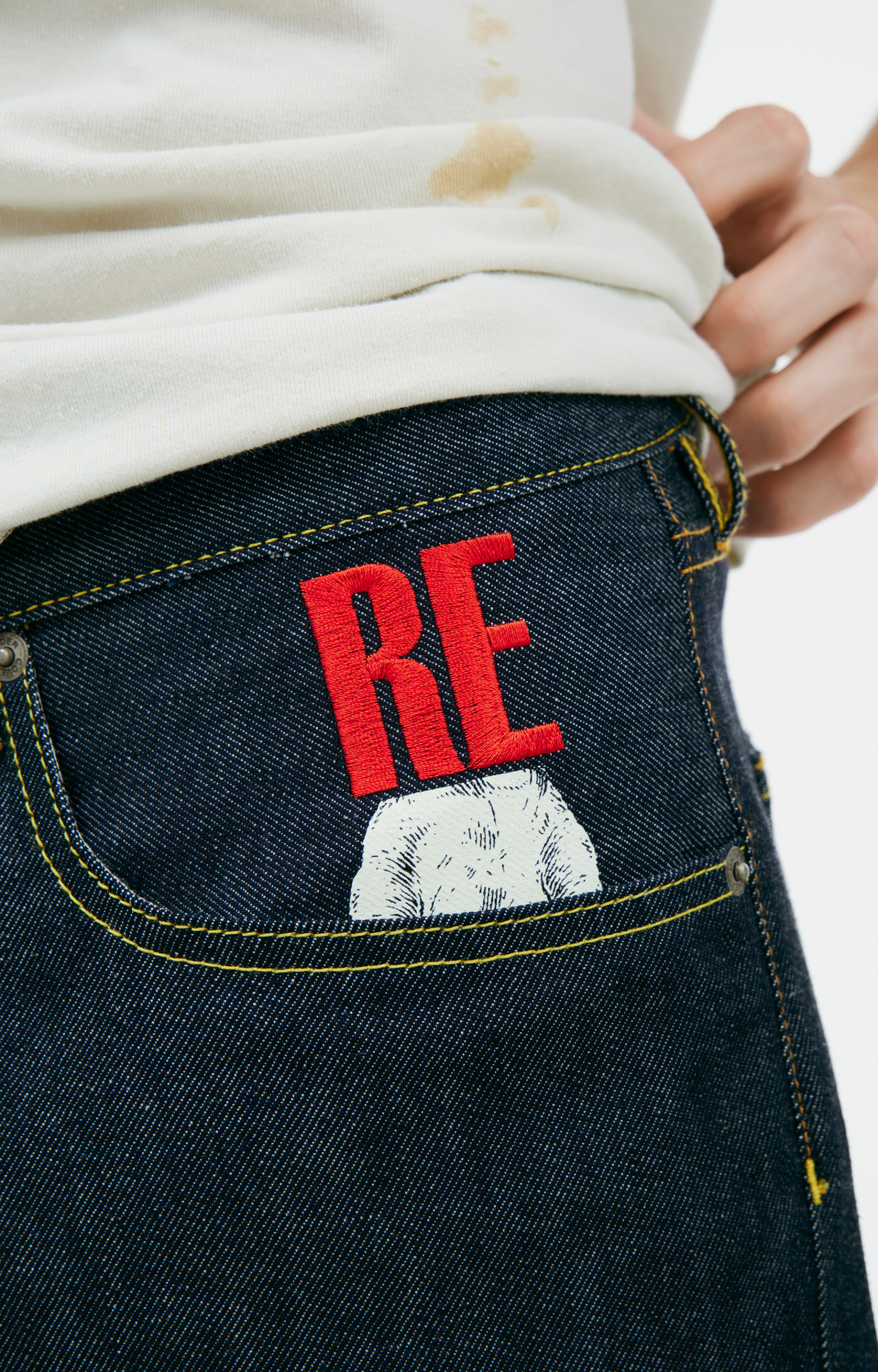 Undercover Embroidered denim shorts