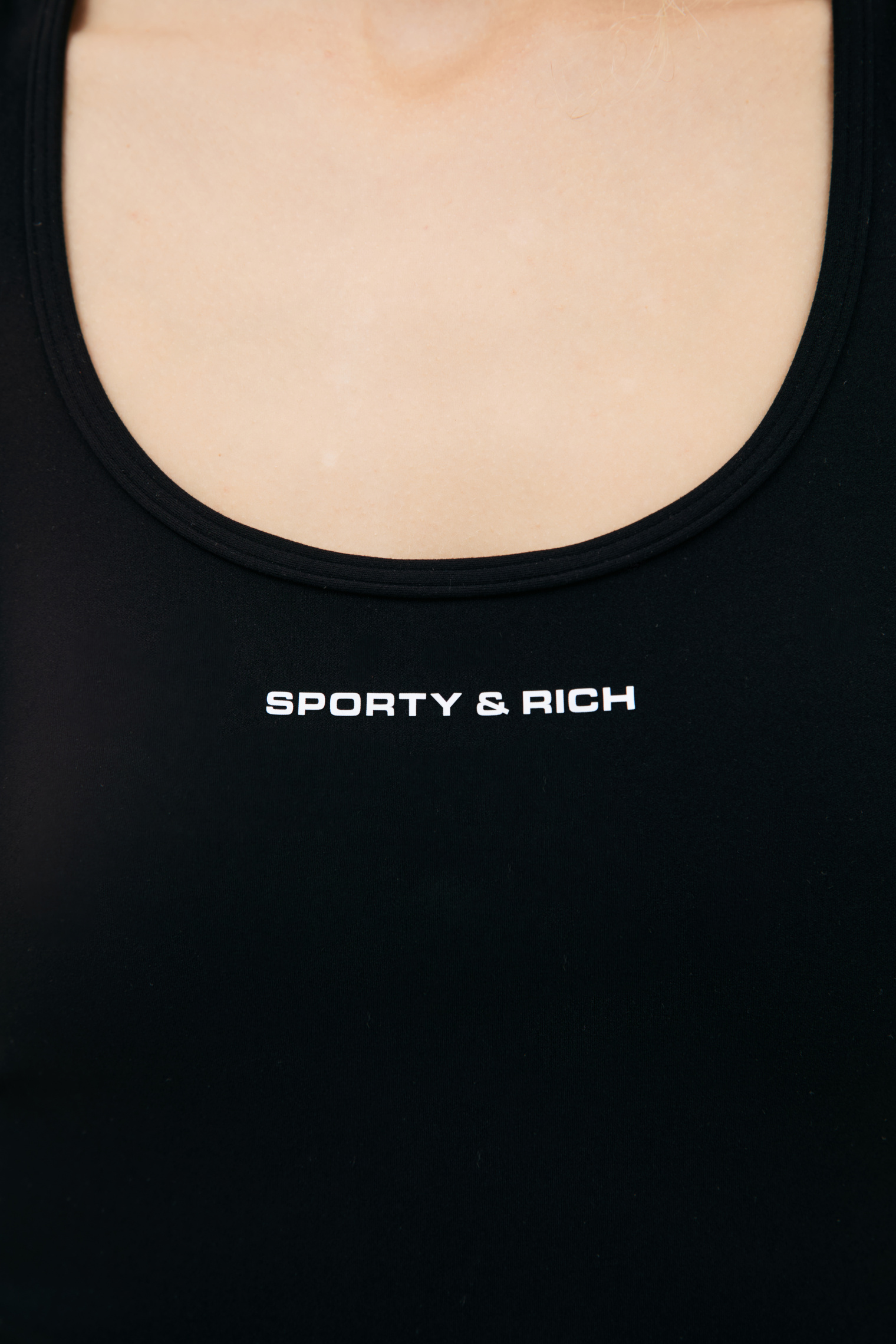 SPORTY & RICH Black logo top