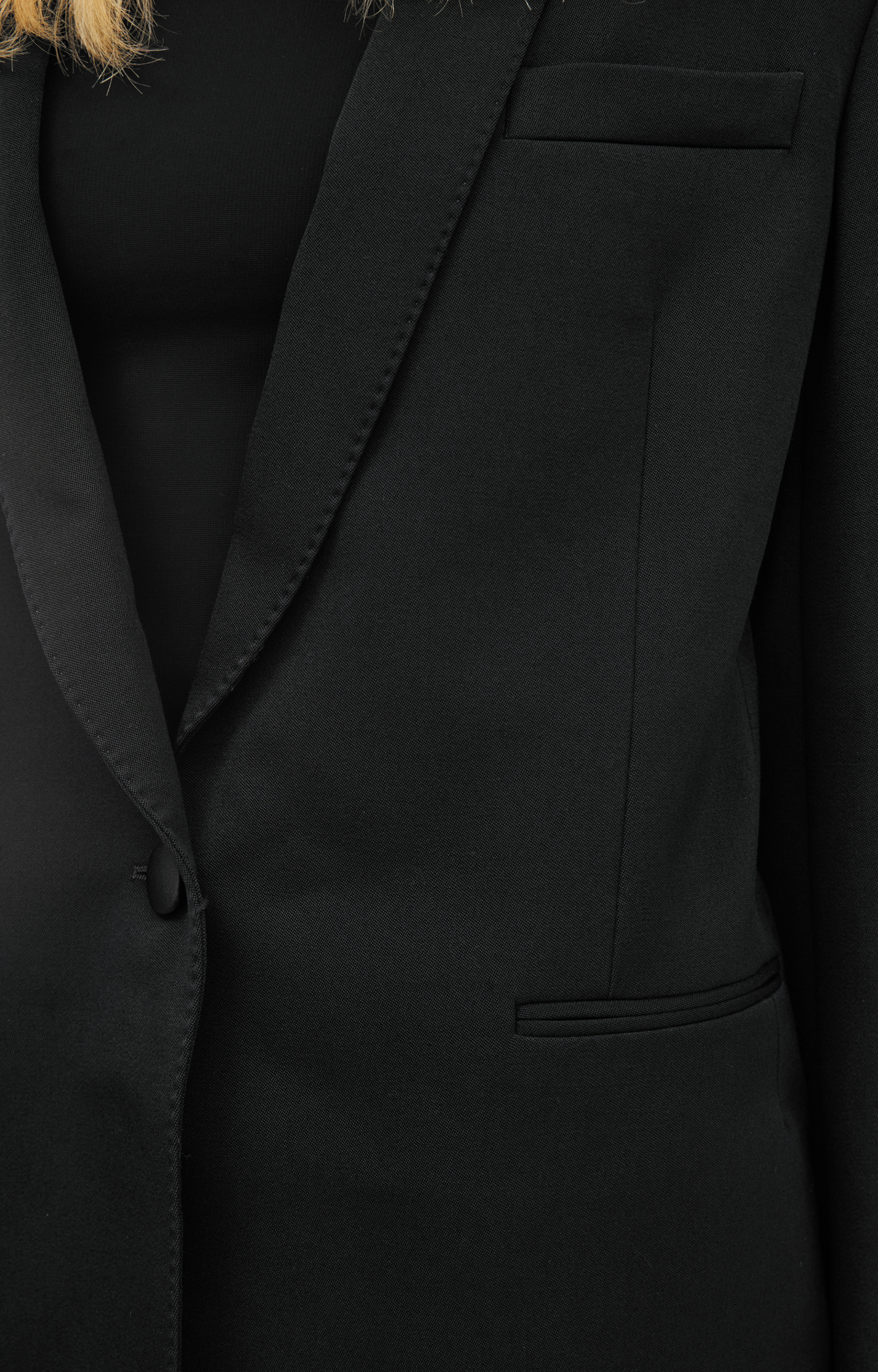 The Row Black blazer with a V-neck