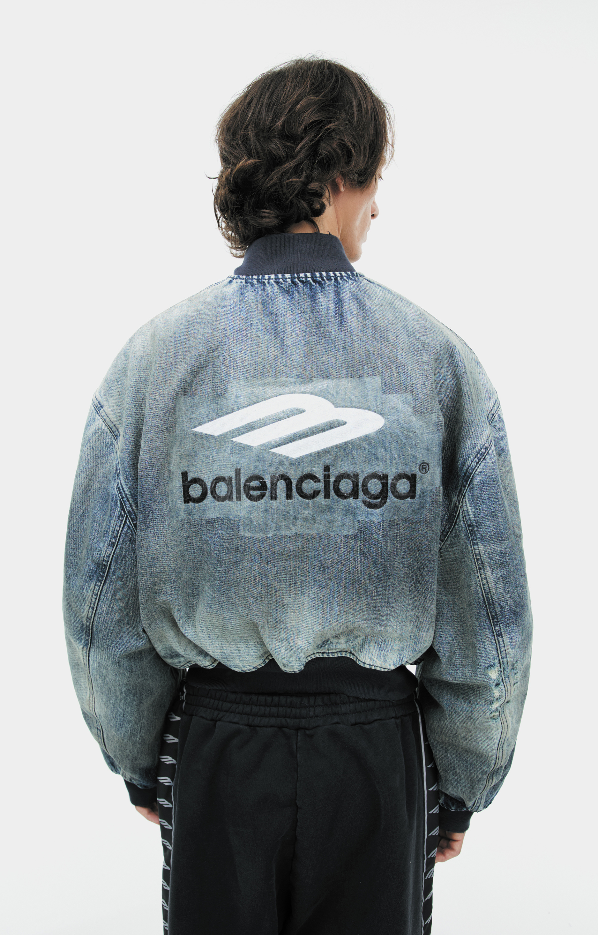 Balenciaga Distressed denim bomber jacket