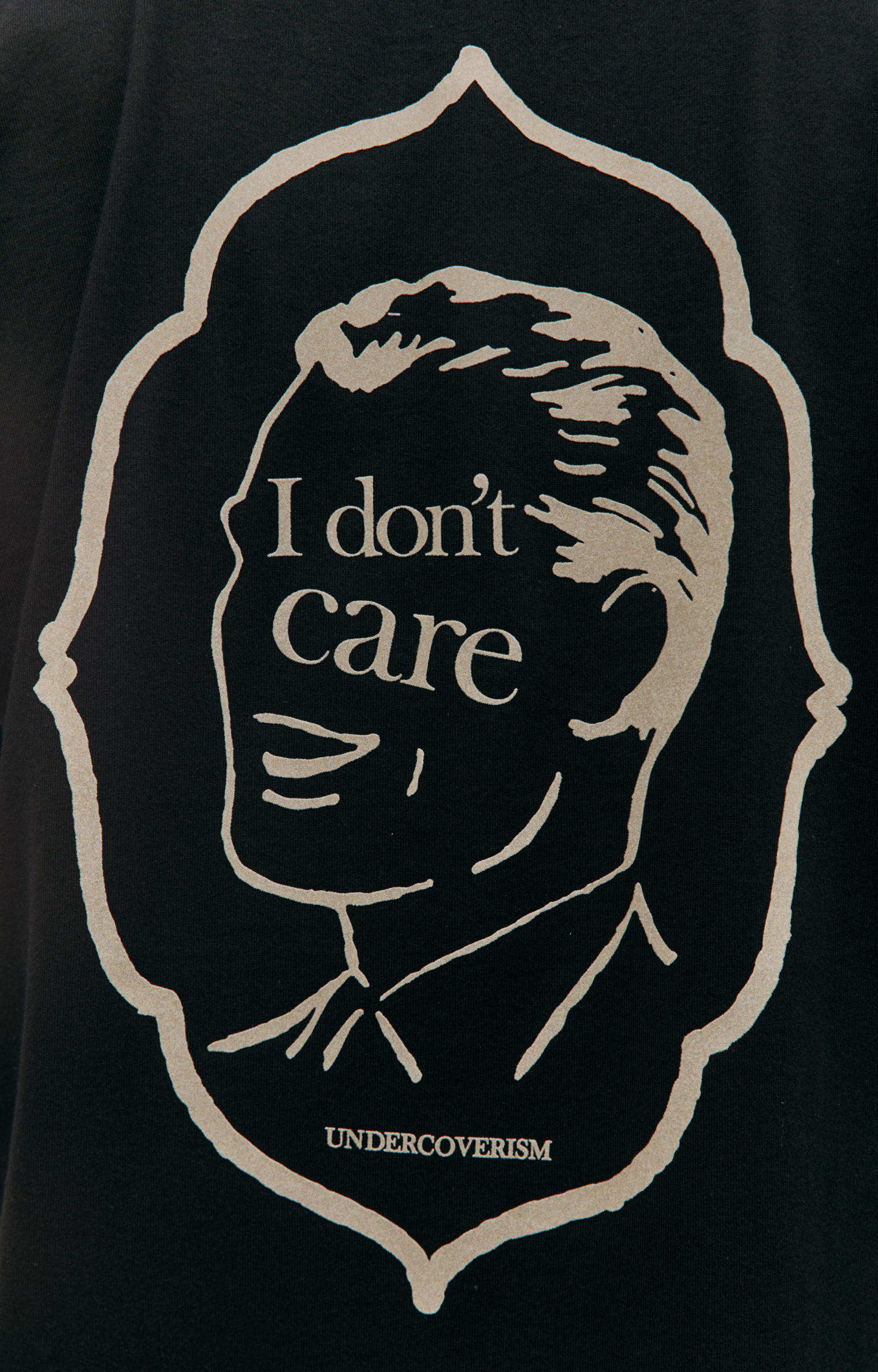 Buy Undercover men black 'i don't care' printed t-shirt for $215