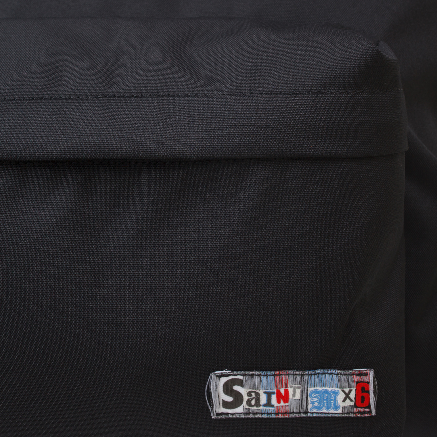 Saint Michael Black small backpack  with logo patch