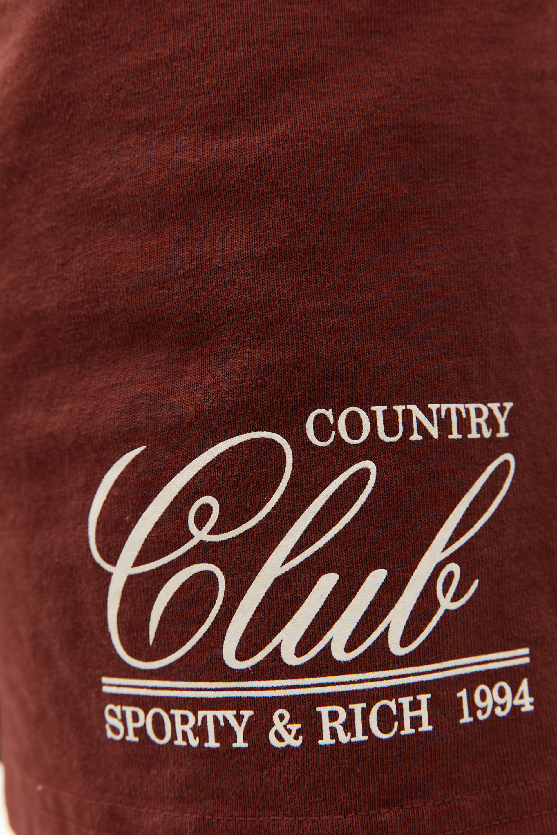 SPORTY & RICH \'Country Club\' printed shorts