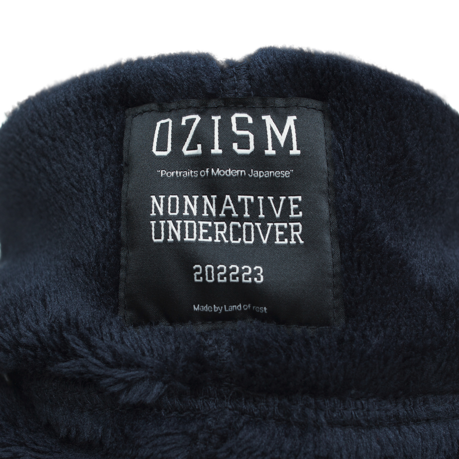 Undercover Undercover x Nonnative fleece scarf with patch