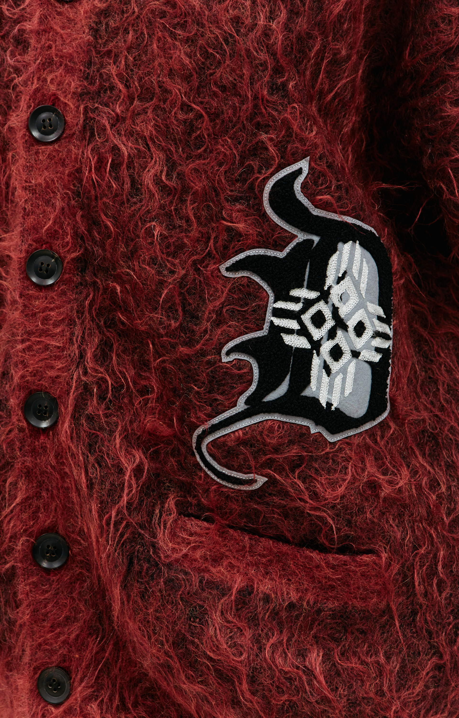 Children of the discordance Patched wool cardigan