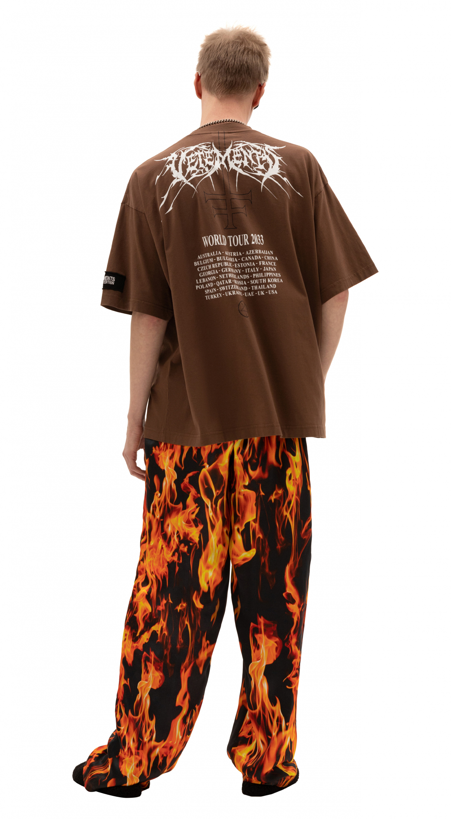 Buy VETEMENTS men brown world tour patched t-shirt for €345 online